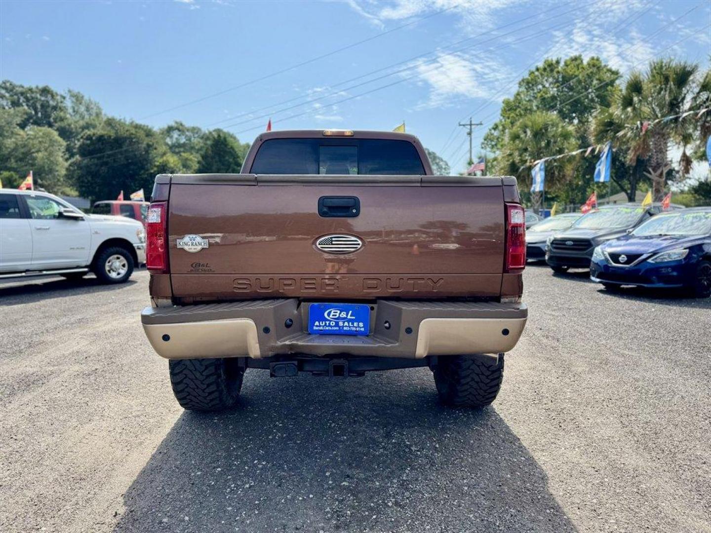2011 Brown /Brown Ford F250sd (1FT7W2BT6BE) with an 6.7l V8 DI OHC Tdsl 6.7l engine, Automatic transmission, located at 745 East Steele Rd., West Columbia, SC, 29170, (803) 755-9148, 33.927212, -81.148483 - Special Internet Price! 2011 Ford F250SD with AM/FM radio, Bluetooth, Backup camera, Navigation, Cruise control, Leather interior, Powered front seats, Powered windows, Powered door locks, Plus more! - Photo#4