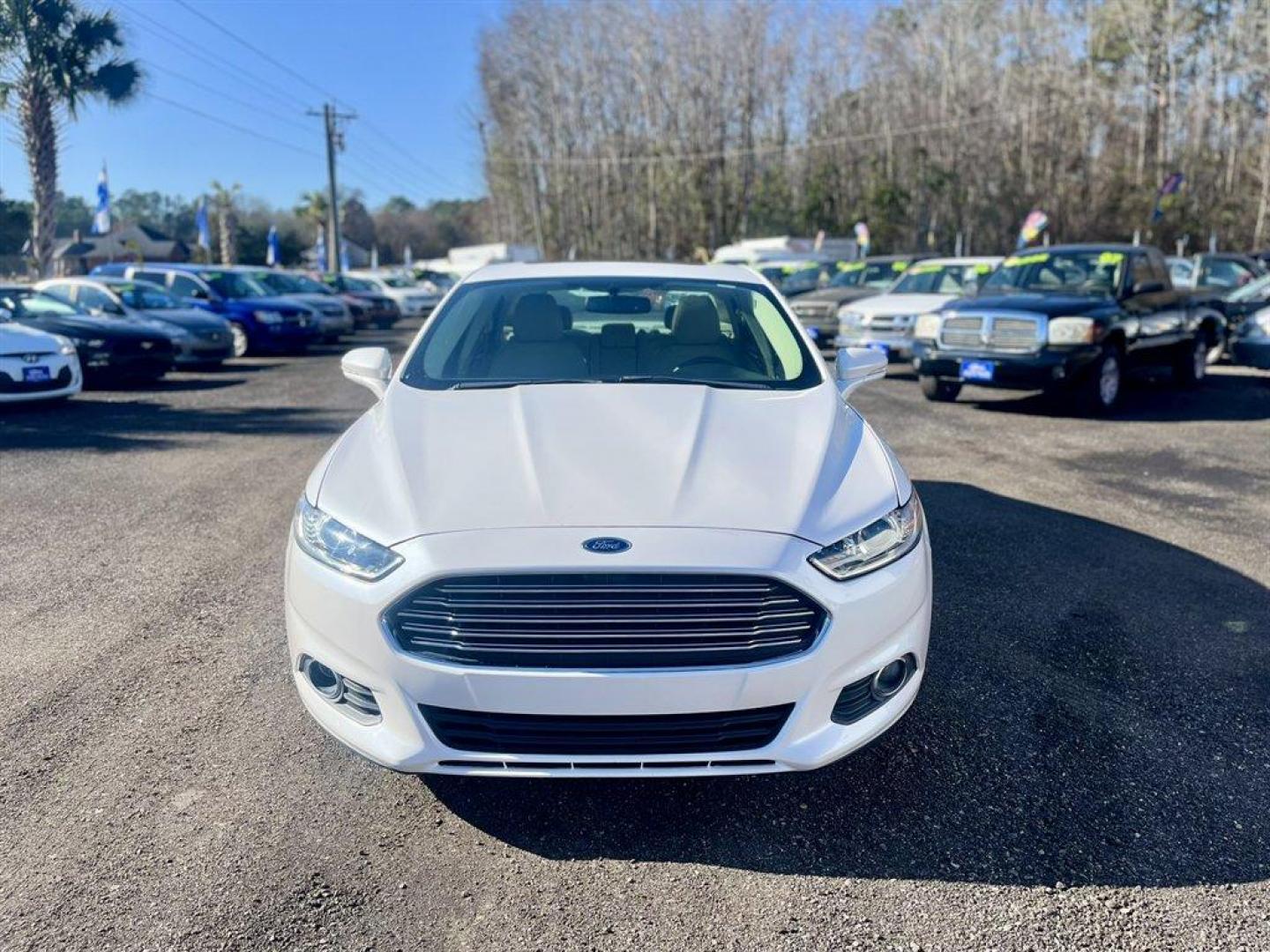 2016 White /Taupe Ford Fusion (3FA6P0LU5GR) with an 2.0l I-4 Smpi Dohc Hybrid engine, Automatic transmission, located at 745 East Steele Rd., West Columbia, SC, 29170, (803) 755-9148, 33.927212, -81.148483 - Special Internet Price! 2016 Ford Fusion SE Hybrid - Photo#7