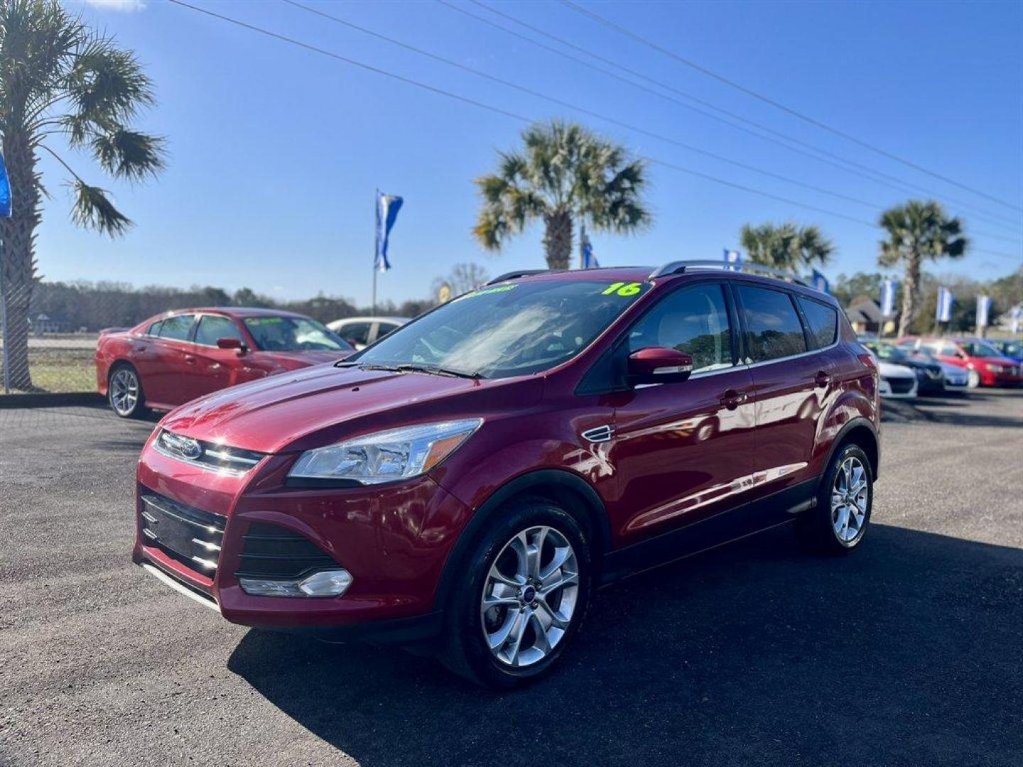 2016 Burgundy /Taupe Ford Escape (1FMCU0JX8GU) with an 1.6l I-4 DI Dohc TC Ecobt engine, Automatic transmission, located at 745 East Steele Rd., West Columbia, SC, 29170, (803) 755-9148, 33.927212, -81.148483 - Special Internet Price! 2016 Ford Escape with AM/FM radio, Bluetooth, Backup camera, Push to start, Keyless entry, Leather interior, Heated front seats, Powered front seats, Powered liftgate, Powered door locks, Powered windows, Plus more! - Photo#0