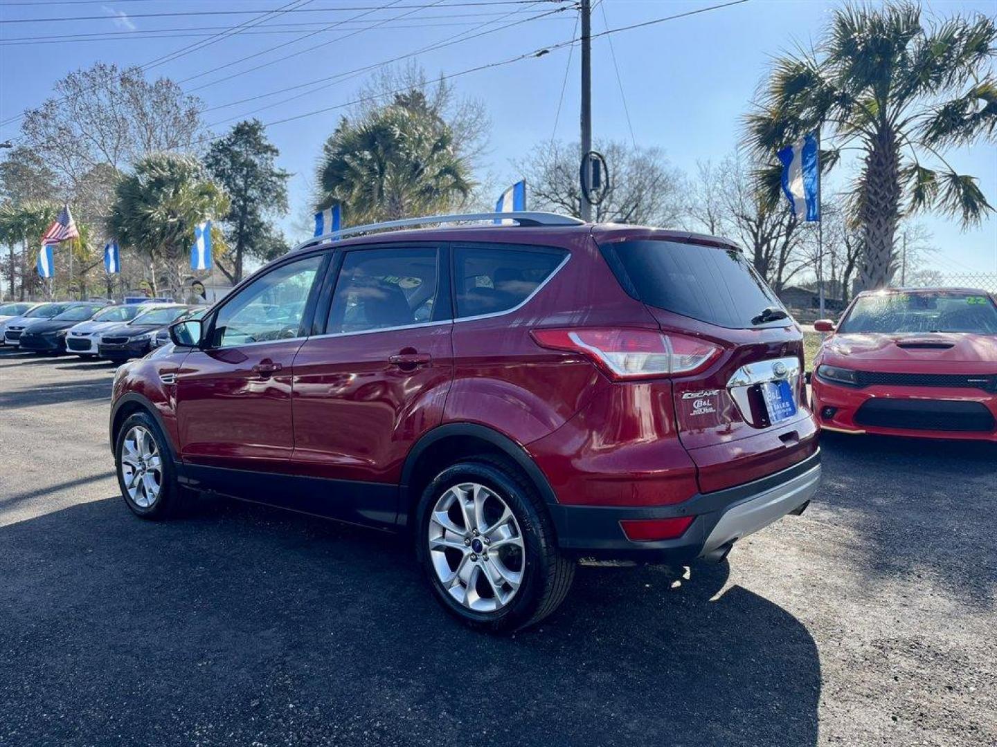 2016 Burgundy /Taupe Ford Escape (1FMCU0JX8GU) with an 1.6l I-4 DI Dohc TC Ecobt engine, Automatic transmission, located at 745 East Steele Rd., West Columbia, SC, 29170, (803) 755-9148, 33.927212, -81.148483 - Special Internet Price! 2016 Ford Escape with AM/FM radio, Bluetooth, Backup camera, Push to start, Keyless entry, Leather interior, Heated front seats, Powered front seats, Powered liftgate, Powered door locks, Powered windows, Plus more! - Photo#1