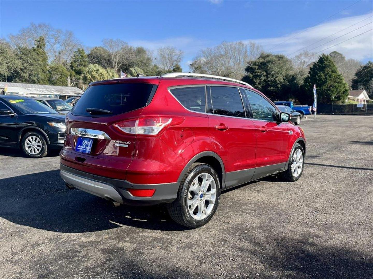 2016 Burgundy /Taupe Ford Escape (1FMCU0JX8GU) with an 1.6l I-4 DI Dohc TC Ecobt engine, Automatic transmission, located at 745 East Steele Rd., West Columbia, SC, 29170, (803) 755-9148, 33.927212, -81.148483 - Special Internet Price! 2016 Ford Escape with AM/FM radio, Bluetooth, Backup camera, Push to start, Keyless entry, Leather interior, Heated front seats, Powered front seats, Powered liftgate, Powered door locks, Powered windows, Plus more! - Photo#3