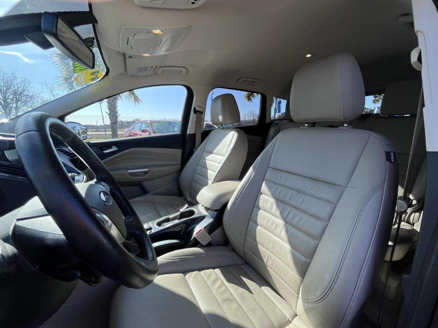 2016 Burgundy /Taupe Ford Escape (1FMCU0JX8GU) with an 1.6l I-4 DI Dohc TC Ecobt engine, Automatic transmission, located at 745 East Steele Rd., West Columbia, SC, 29170, (803) 755-9148, 33.927212, -81.148483 - Special Internet Price! 2016 Ford Escape with AM/FM radio, Bluetooth, Backup camera, Push to start, Keyless entry, Leather interior, Heated front seats, Powered front seats, Powered liftgate, Powered door locks, Powered windows, Plus more! - Photo#20