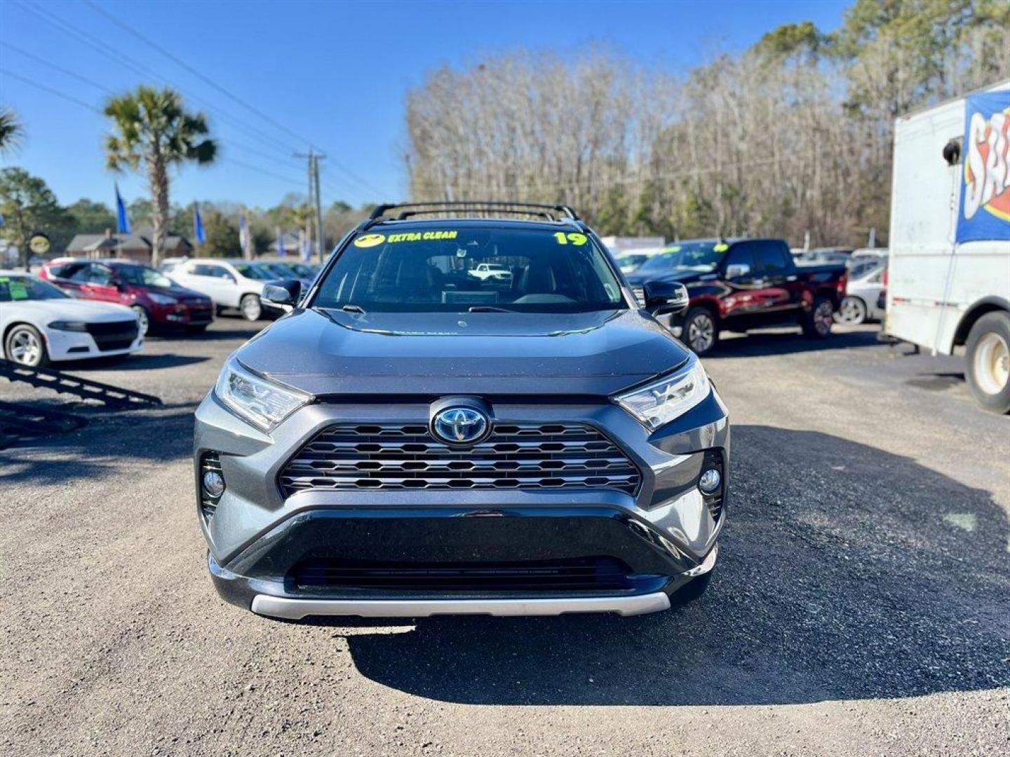 2019 Grey /Black Toyota RAV4 (2T3EWRFV7KW) with an 2.5l I-4 EFI Dohc Hybrid engine, Automatic transmission, located at 745 East Steele Rd., West Columbia, SC, 29170, (803) 755-9148, 33.927212, -81.148483 - Special Internet Price! 2019 Toyota RAV4 with AM/FM radio, Bluetooth, Backup camera, Navigation, Sunroof, Luggage rack, Push to start, Keyless entry, Leather interior, Heated front seats, Powered driver seat, Powered windows, Powered door locks, Plus more! - Photo#1
