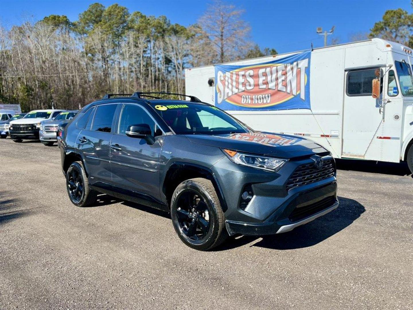 2019 Grey /Black Toyota RAV4 (2T3EWRFV7KW) with an 2.5l I-4 EFI Dohc Hybrid engine, Automatic transmission, located at 745 East Steele Rd., West Columbia, SC, 29170, (803) 755-9148, 33.927212, -81.148483 - Special Internet Price! 2019 Toyota RAV4 with AM/FM radio, Bluetooth, Backup camera, Navigation, Sunroof, Luggage rack, Push to start, Keyless entry, Leather interior, Heated front seats, Powered driver seat, Powered windows, Powered door locks, Plus more! - Photo#2