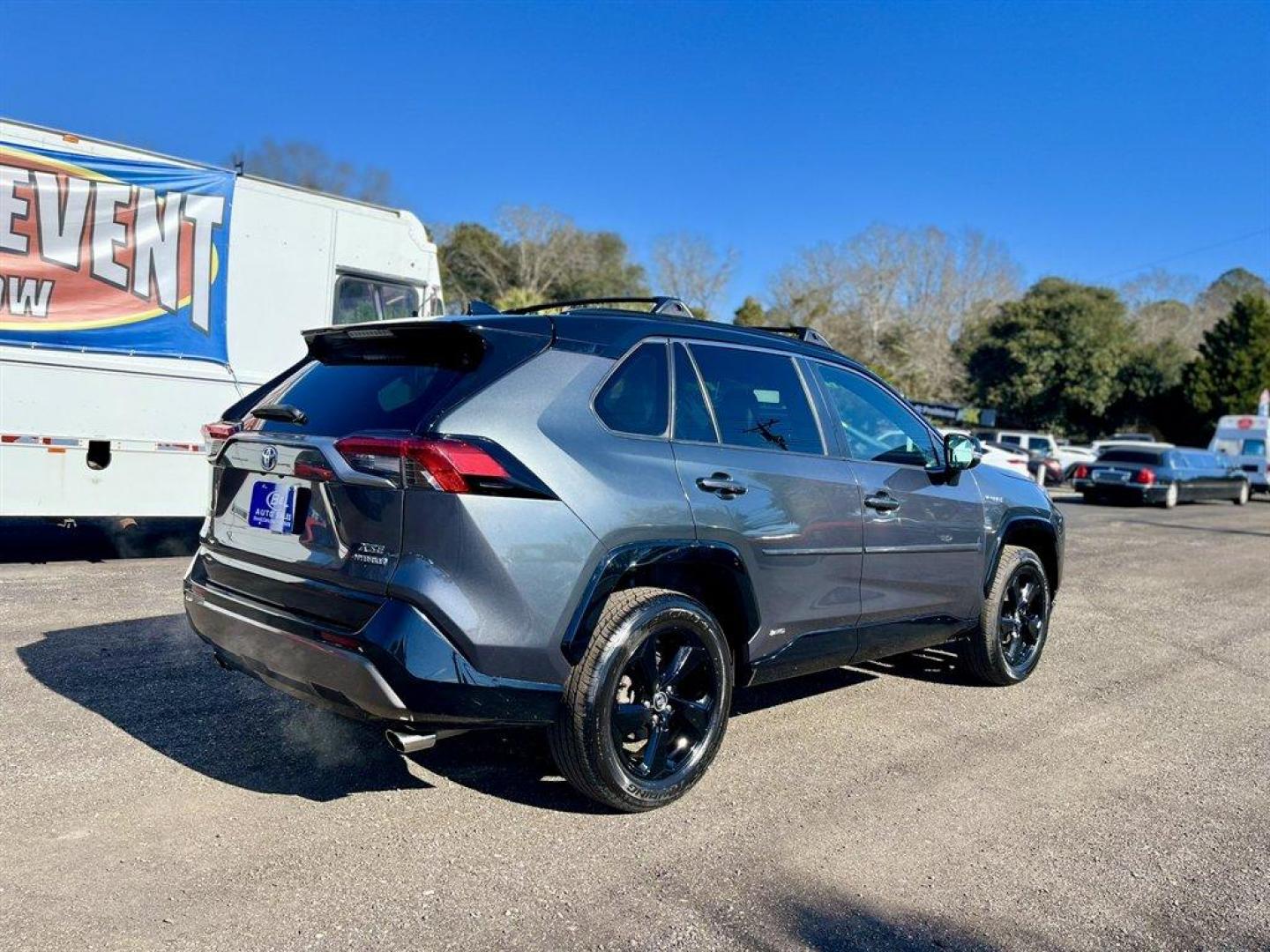 2019 Grey /Black Toyota RAV4 (2T3EWRFV7KW) with an 2.5l I-4 EFI Dohc Hybrid engine, Automatic transmission, located at 745 East Steele Rd., West Columbia, SC, 29170, (803) 755-9148, 33.927212, -81.148483 - Special Internet Price! 2019 Toyota RAV4 with AM/FM radio, Bluetooth, Backup camera, Navigation, Sunroof, Luggage rack, Push to start, Keyless entry, Leather interior, Heated front seats, Powered driver seat, Powered windows, Powered door locks, Plus more! - Photo#3