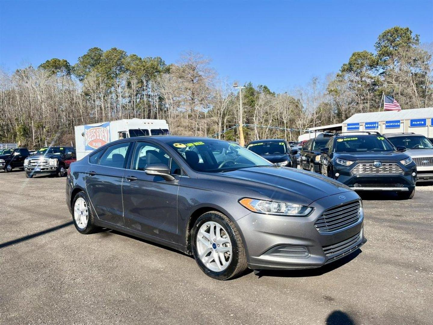 2014 Grey /Black Ford Fusion (3FA6P0H7XER) with an 2.5l I-4 Smpi Dohc 2.5l engine, Automatic transmission, located at 745 East Steele Rd., West Columbia, SC, 29170, (803) 755-9148, 33.927212, -81.148483 - Special Internet Price! 2014 Ford Fusion with AM/FM radio, Cruise control, Manual air conditioning, Cloth interior, Powered driver seat, Powered windows, Powered door locks, Plus more! - Photo#2