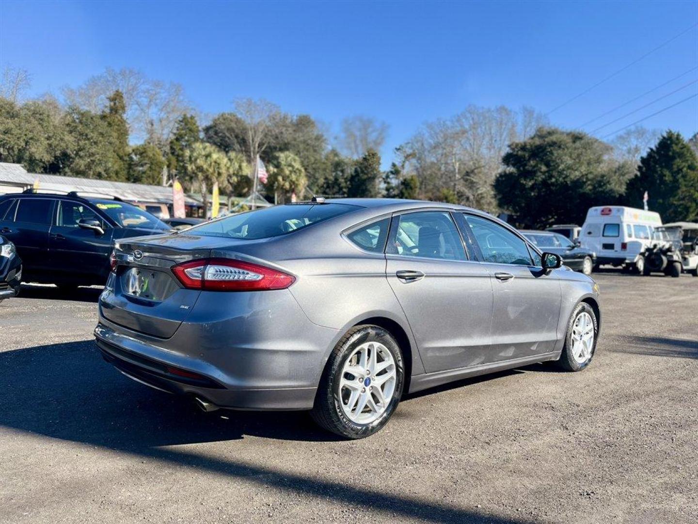 2014 Grey /Black Ford Fusion (3FA6P0H7XER) with an 2.5l I-4 Smpi Dohc 2.5l engine, Automatic transmission, located at 745 East Steele Rd., West Columbia, SC, 29170, (803) 755-9148, 33.927212, -81.148483 - Special Internet Price! 2014 Ford Fusion with AM/FM radio, Cruise control, Manual air conditioning, Cloth interior, Powered driver seat, Powered windows, Powered door locks, Plus more! - Photo#3