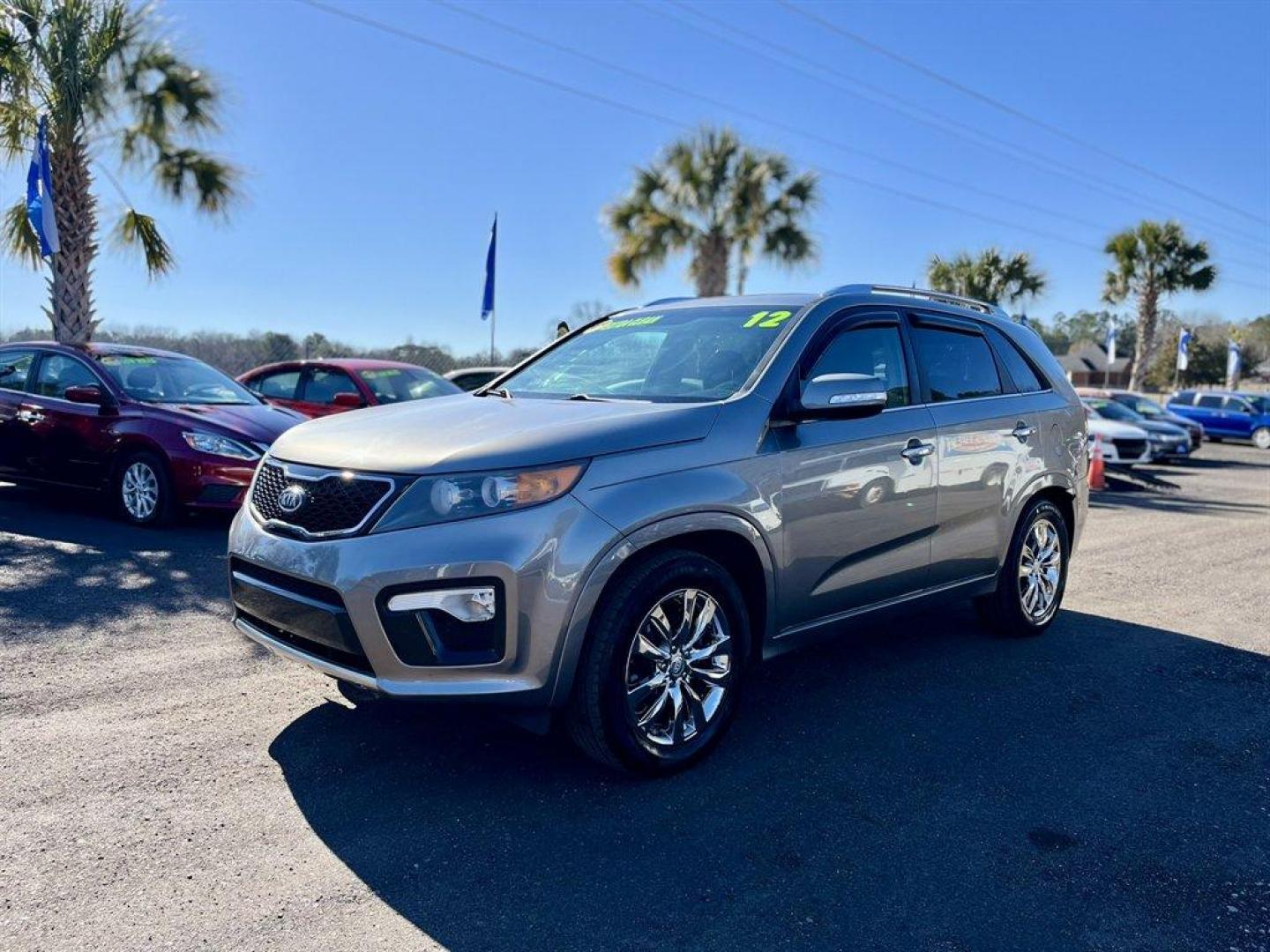 2012 Grey /Black Kia Sorento (5XYKW4A22CG) with an 3.5l V6 MPI Dohc Cvvt 3.5 engine, Automatic transmission, located at 745 East Steele Rd., West Columbia, SC, 29170, (803) 755-9148, 33.927212, -81.148483 - Special Internet Price! 2012 Kia Sorento with AM/FM radio, Cruise control, Backup camera, Navigation, Leather interior, 3rd row seating, Powered window, Powered door locks, Plus more! - Photo#0