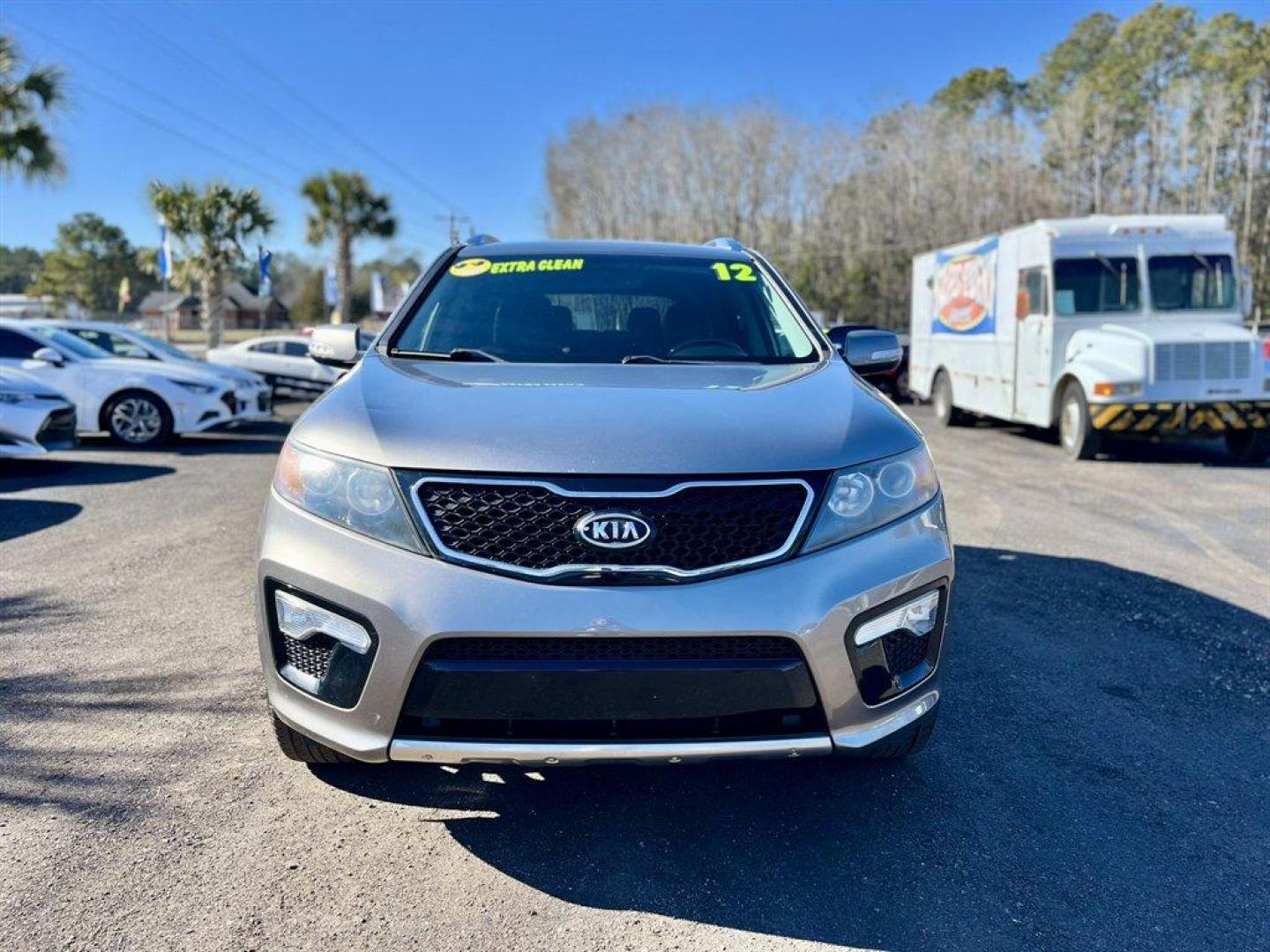 2012 Grey /Black Kia Sorento (5XYKW4A22CG) with an 3.5l V6 MPI Dohc Cvvt 3.5 engine, Automatic transmission, located at 745 East Steele Rd., West Columbia, SC, 29170, (803) 755-9148, 33.927212, -81.148483 - Special Internet Price! 2012 Kia Sorento with AM/FM radio, Cruise control, Backup camera, Navigation, Leather interior, 3rd row seating, Powered window, Powered door locks, Plus more! - Photo#1