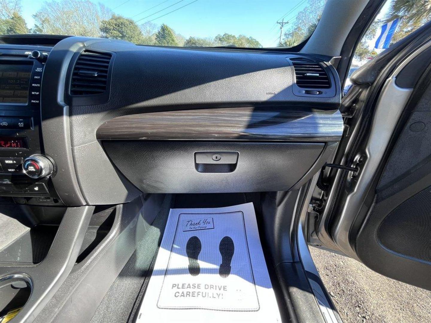 2012 Grey /Black Kia Sorento (5XYKW4A22CG) with an 3.5l V6 MPI Dohc Cvvt 3.5 engine, Automatic transmission, located at 745 East Steele Rd., West Columbia, SC, 29170, (803) 755-9148, 33.927212, -81.148483 - Special Internet Price! 2012 Kia Sorento with AM/FM radio, Cruise control, Backup camera, Navigation, Leather interior, 3rd row seating, Powered window, Powered door locks, Plus more! - Photo#32