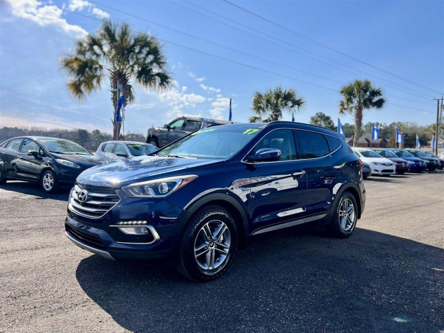 2017 Blue /Taupe Hyundai Santa FE Sport (5XYZU3LB8HG) with an 2.4l I-4 DI Dohc 2.4l engine, Automatic transmission, located at 745 East Steele Rd., West Columbia, SC, 29170, (803) 755-9148, 33.927212, -81.148483 - Special Internet Price! 2017 Hyundai Santa Fe Sport with AM/FM radio, Bluetooth, Backup camera, Navigation, Cruise control, Panoramic sunroof, Push to start, Keyless entry, Leather interior, Heated seats, Powered front seats, Built in rear sun shades, Powered windows, Powered door locks, Plus more! - Photo#0
