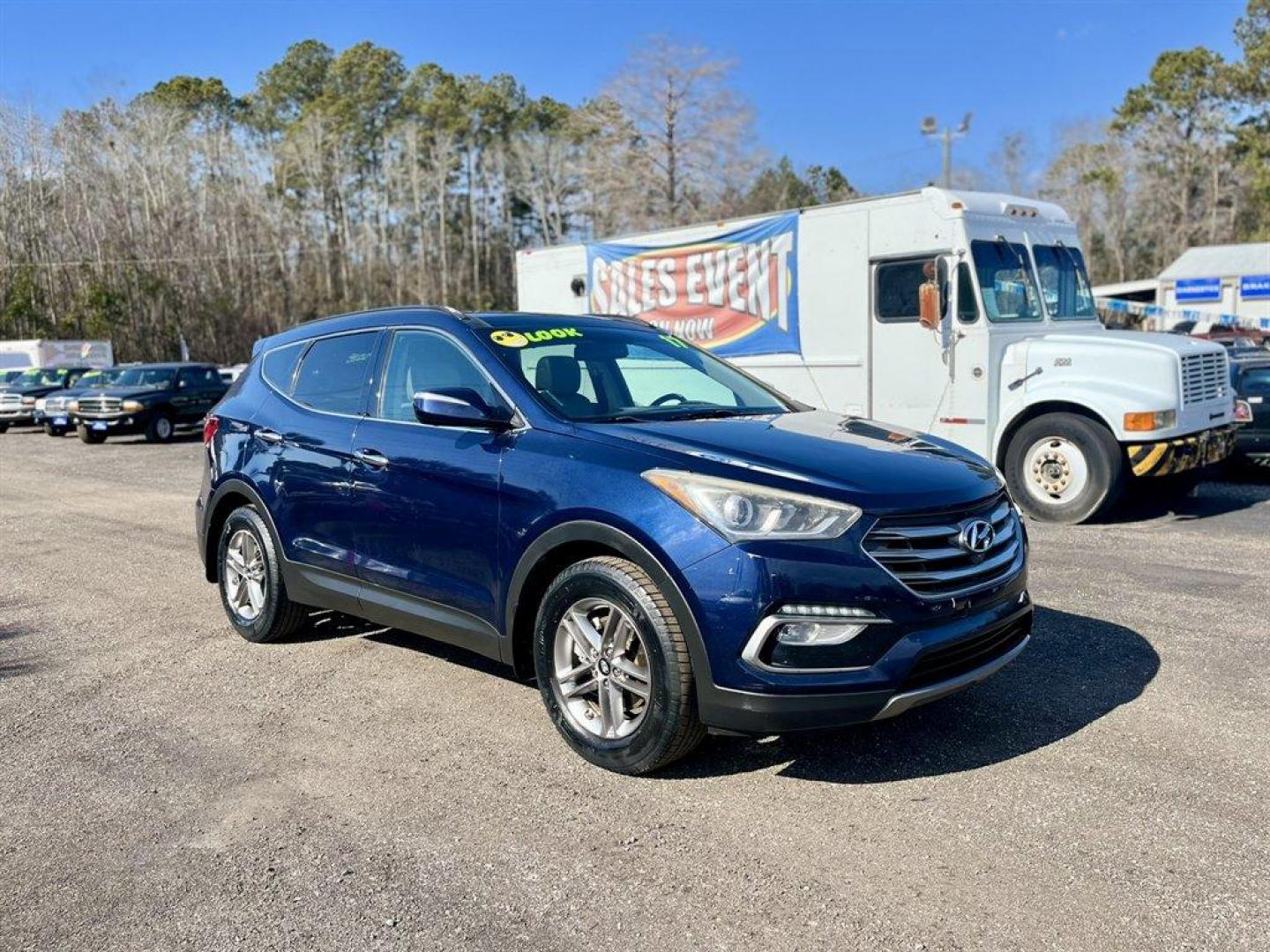 2017 Blue /Taupe Hyundai Santa FE Sport (5XYZU3LB8HG) with an 2.4l I-4 DI Dohc 2.4l engine, Automatic transmission, located at 745 East Steele Rd., West Columbia, SC, 29170, (803) 755-9148, 33.927212, -81.148483 - Special Internet Price! 2017 Hyundai Santa Fe Sport with AM/FM radio, Bluetooth, Backup camera, Navigation, Cruise control, Panoramic sunroof, Push to start, Keyless entry, Leather interior, Heated seats, Powered front seats, Built in rear sun shades, Powered windows, Powered door locks, Plus more! - Photo#2