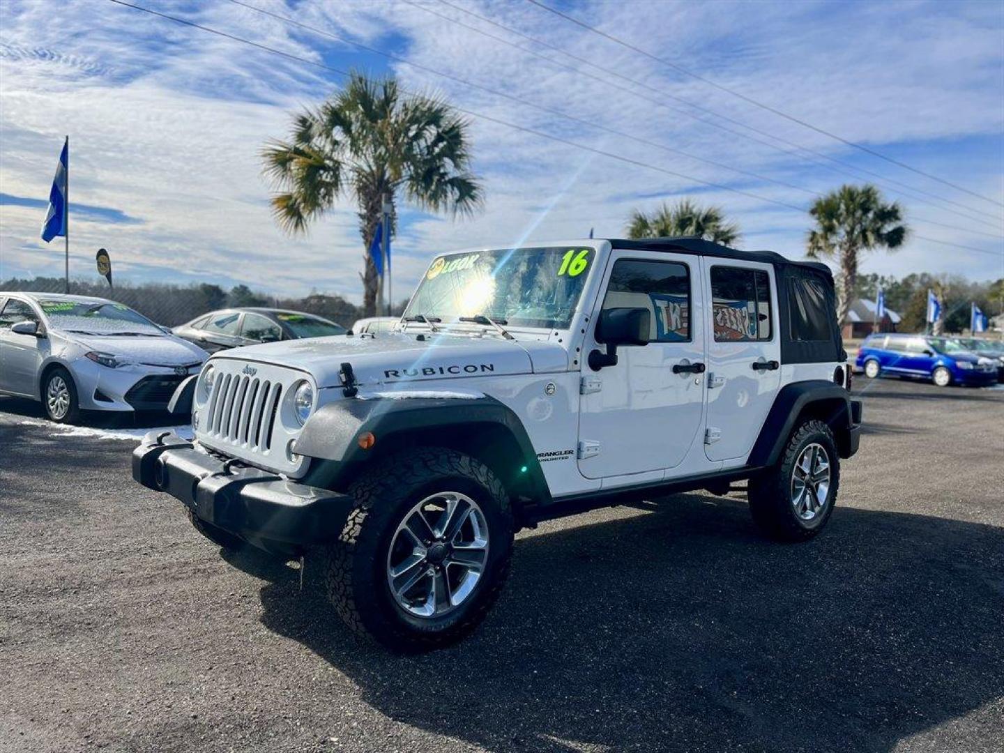 2016 White /Black Jeep Wrangler (1C4HJWFGXGL) with an 3.6l V6 MPI Dohc 3.6l engine, Automatic transmission, located at 745 East Steele Rd., West Columbia, SC, 29170, (803) 755-9148, 33.927212, -81.148483 - Special Internet Price! 2016 Jeep Wrangler with AM/FM radio, Cruise control, Cloth interior, Powered windows, Removable soft top, 4X4, Manual air conditioning, Powered door locks, Plus more! - Photo#0