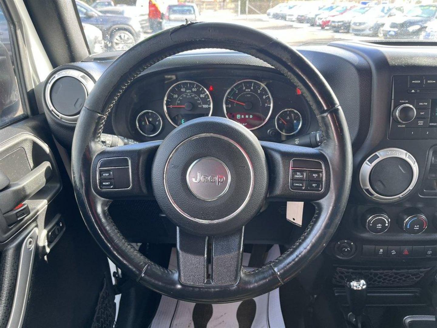 2016 White /Black Jeep Wrangler (1C4HJWFGXGL) with an 3.6l V6 MPI Dohc 3.6l engine, Automatic transmission, located at 745 East Steele Rd., West Columbia, SC, 29170, (803) 755-9148, 33.927212, -81.148483 - Special Internet Price! 2016 Jeep Wrangler with AM/FM radio, Cruise control, Cloth interior, Powered windows, Removable soft top, 4X4, Manual air conditioning, Powered door locks, Plus more! - Photo#7