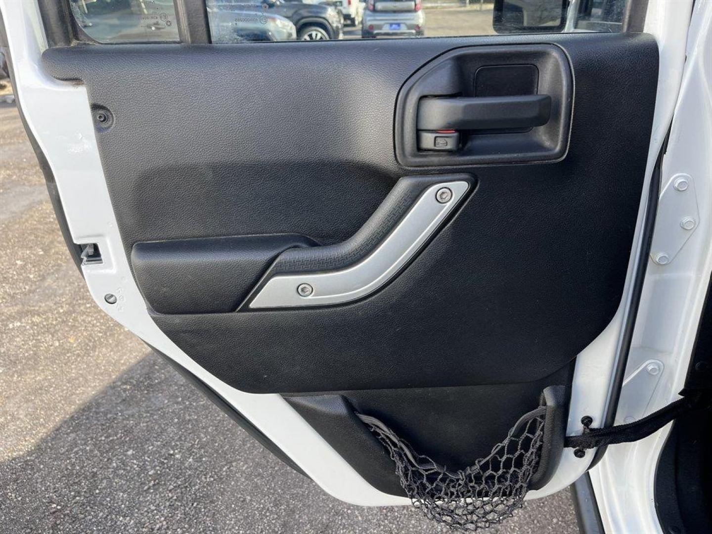 2016 White /Black Jeep Wrangler (1C4HJWFGXGL) with an 3.6l V6 MPI Dohc 3.6l engine, Automatic transmission, located at 745 East Steele Rd., West Columbia, SC, 29170, (803) 755-9148, 33.927212, -81.148483 - Special Internet Price! 2016 Jeep Wrangler with AM/FM radio, Cruise control, Cloth interior, Powered windows, Removable soft top, 4X4, Manual air conditioning, Powered door locks, Plus more! - Photo#22