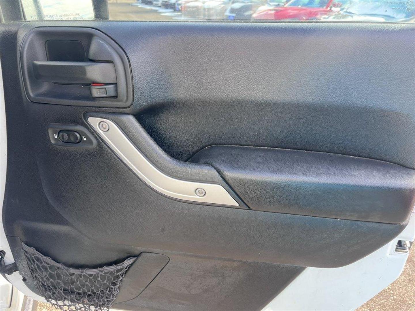 2016 White /Black Jeep Wrangler (1C4HJWFGXGL) with an 3.6l V6 MPI Dohc 3.6l engine, Automatic transmission, located at 745 East Steele Rd., West Columbia, SC, 29170, (803) 755-9148, 33.927212, -81.148483 - Special Internet Price! 2016 Jeep Wrangler with AM/FM radio, Cruise control, Cloth interior, Powered windows, Removable soft top, 4X4, Manual air conditioning, Powered door locks, Plus more! - Photo#26