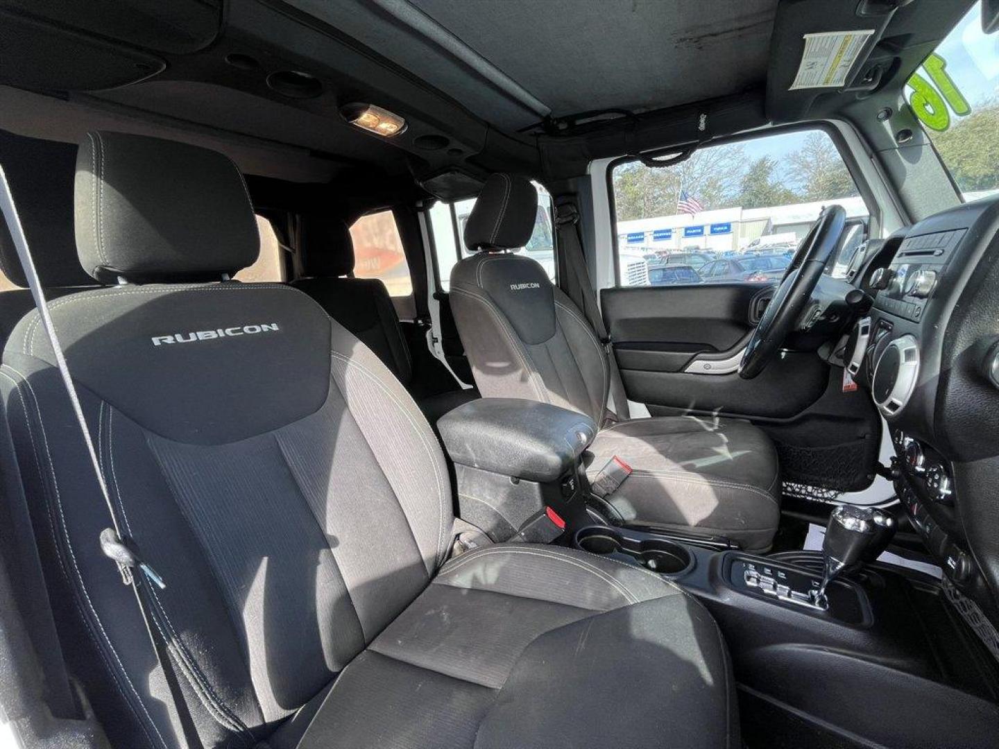 2016 White /Black Jeep Wrangler (1C4HJWFGXGL) with an 3.6l V6 MPI Dohc 3.6l engine, Automatic transmission, located at 745 East Steele Rd., West Columbia, SC, 29170, (803) 755-9148, 33.927212, -81.148483 - Special Internet Price! 2016 Jeep Wrangler with AM/FM radio, Cruise control, Cloth interior, Powered windows, Removable soft top, 4X4, Manual air conditioning, Powered door locks, Plus more! - Photo#27