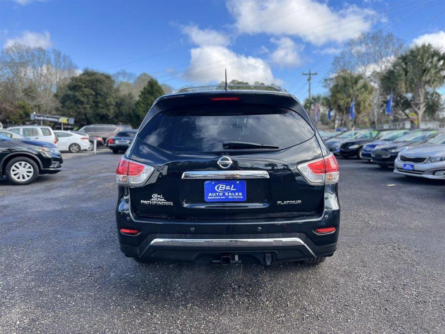 2015 Black /Taupe Nissan Pathfinder (5N1AR2MN9FC) with an 3.5l V6 Smpi Dohc Cvtcs 3 engine, Automatic transmission, located at 745 East Steele Rd., West Columbia, SC, 29170, (803) 755-9148, 33.927212, -81.148483 - Special Internet Price! 2015 Nissan Pathfinder with AM/FM radio, Bluetooth, Navigation, Cruise control, Keyless entry, Push to start, Dual sunroof, Leather interior, 3rd row seating, Heated seats, Powered liftgate, Powered door locks, Powered windows, Plus more! - Photo#2