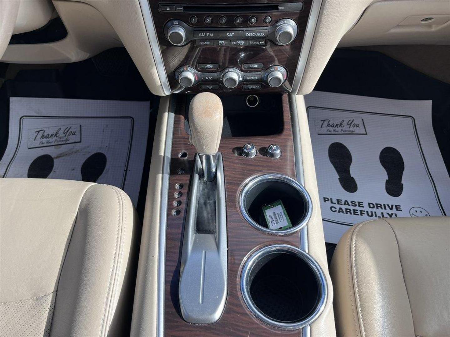 2015 Black /Taupe Nissan Pathfinder (5N1AR2MN9FC) with an 3.5l V6 Smpi Dohc Cvtcs 3 engine, Automatic transmission, located at 745 East Steele Rd., West Columbia, SC, 29170, (803) 755-9148, 33.927212, -81.148483 - Special Internet Price! 2015 Nissan Pathfinder with AM/FM radio, Bluetooth, Navigation, Cruise control, Keyless entry, Push to start, Dual sunroof, Leather interior, 3rd row seating, Heated seats, Powered liftgate, Powered door locks, Powered windows, Plus more! - Photo#16