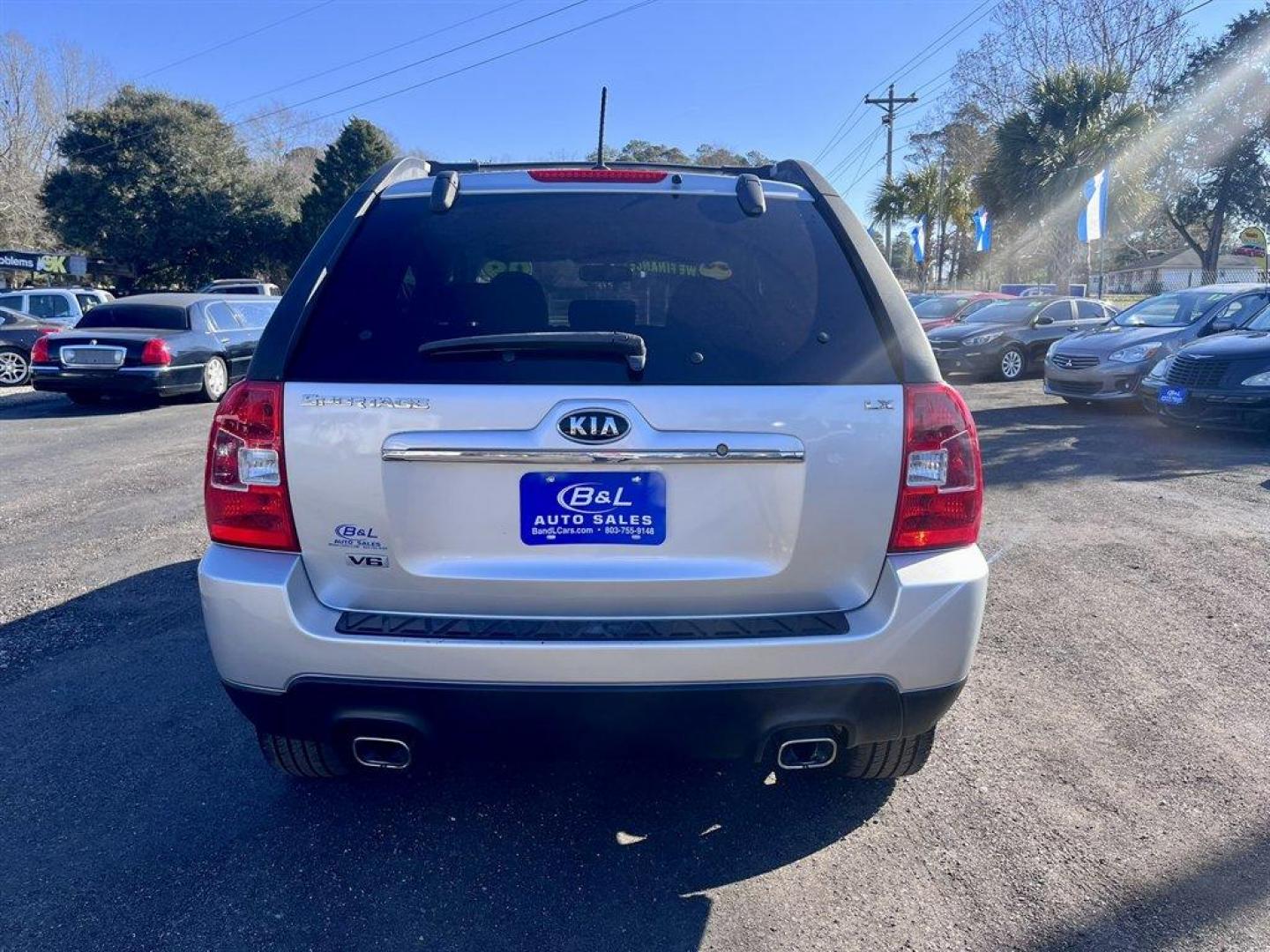 2009 Silver /Black Kia Sportage (KNDJF723997) with an 2.7l V6 MPI Dohc 2.7l engine, Automatic transmission, located at 745 East Steele Rd., West Columbia, SC, 29170, (803) 755-9148, 33.927212, -81.148483 - Special Internet Price! 2009 Kia Sportage with AM/FM radio, Cruise control, Manual air conditioning, Cloth interior, Powered windows, Powered door locks, Plus more! - Photo#4