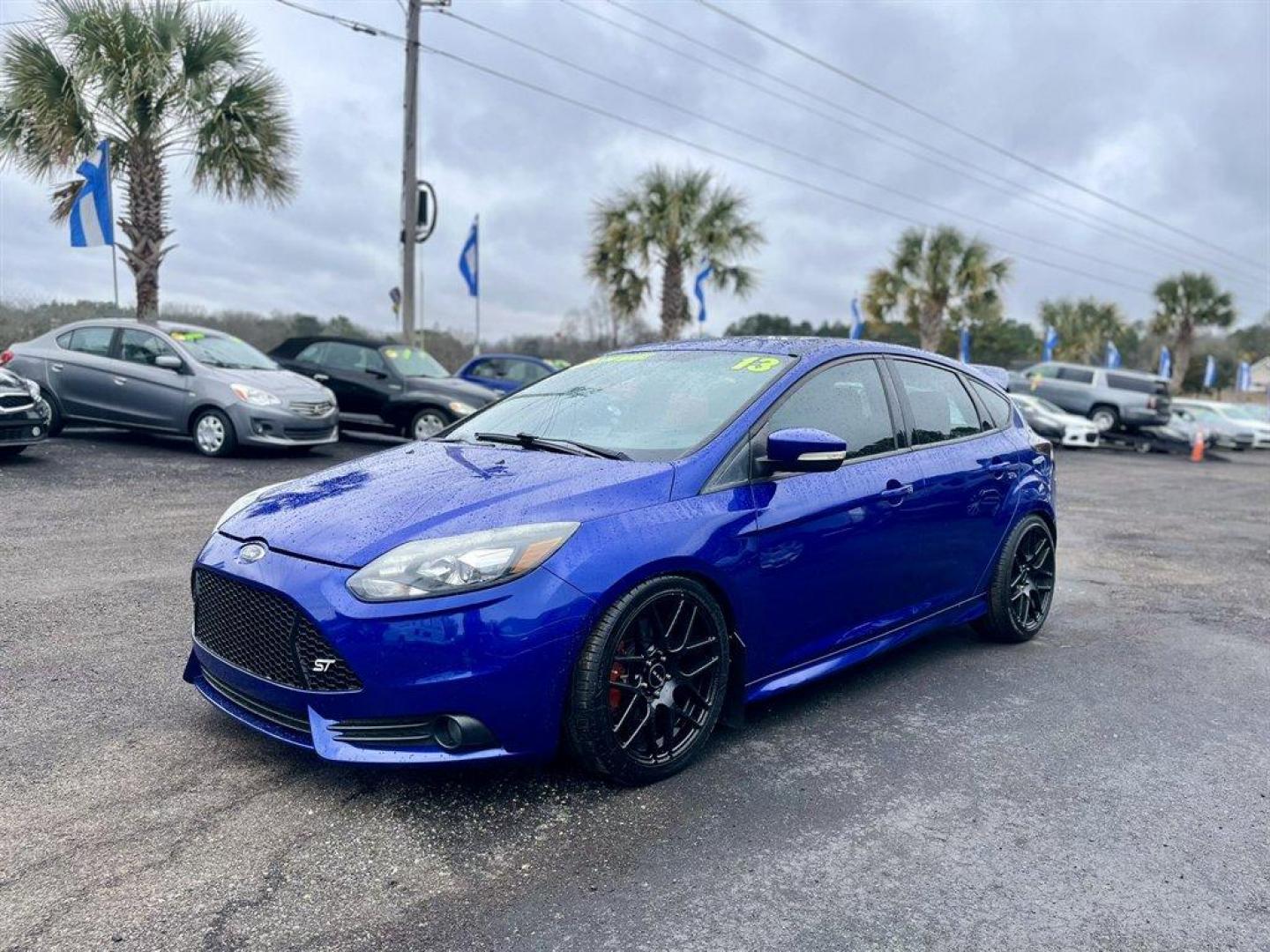 2013 Blue /Black Ford Focus (1FADP3L93DL) with an 2.0l I-4 DI T/C Ecoboost engine, Manual transmission, located at 745 East Steele Rd., West Columbia, SC, 29170, (803) 755-9148, 33.927212, -81.148483 - Special Internet Price! 2013 Ford Focus with AM/FM radio, Bluetooth, Navigation, Cruise control, Sunroof, Push to start, Keyless entry, Manual transmission, Powered windows, Powered door locks, Plus more! - Photo#0