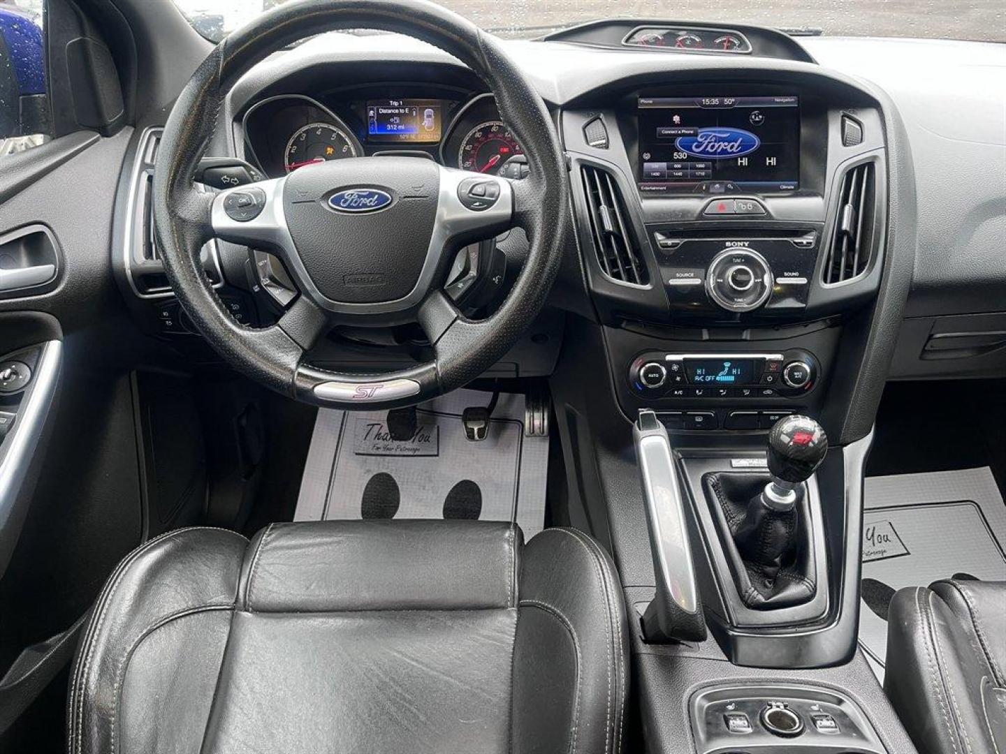 2013 Blue /Black Ford Focus (1FADP3L93DL) with an 2.0l I-4 DI T/C Ecoboost engine, Manual transmission, located at 745 East Steele Rd., West Columbia, SC, 29170, (803) 755-9148, 33.927212, -81.148483 - Special Internet Price! 2013 Ford Focus with AM/FM radio, Bluetooth, Navigation, Cruise control, Sunroof, Push to start, Keyless entry, Manual transmission, Powered windows, Powered door locks, Plus more! - Photo#6