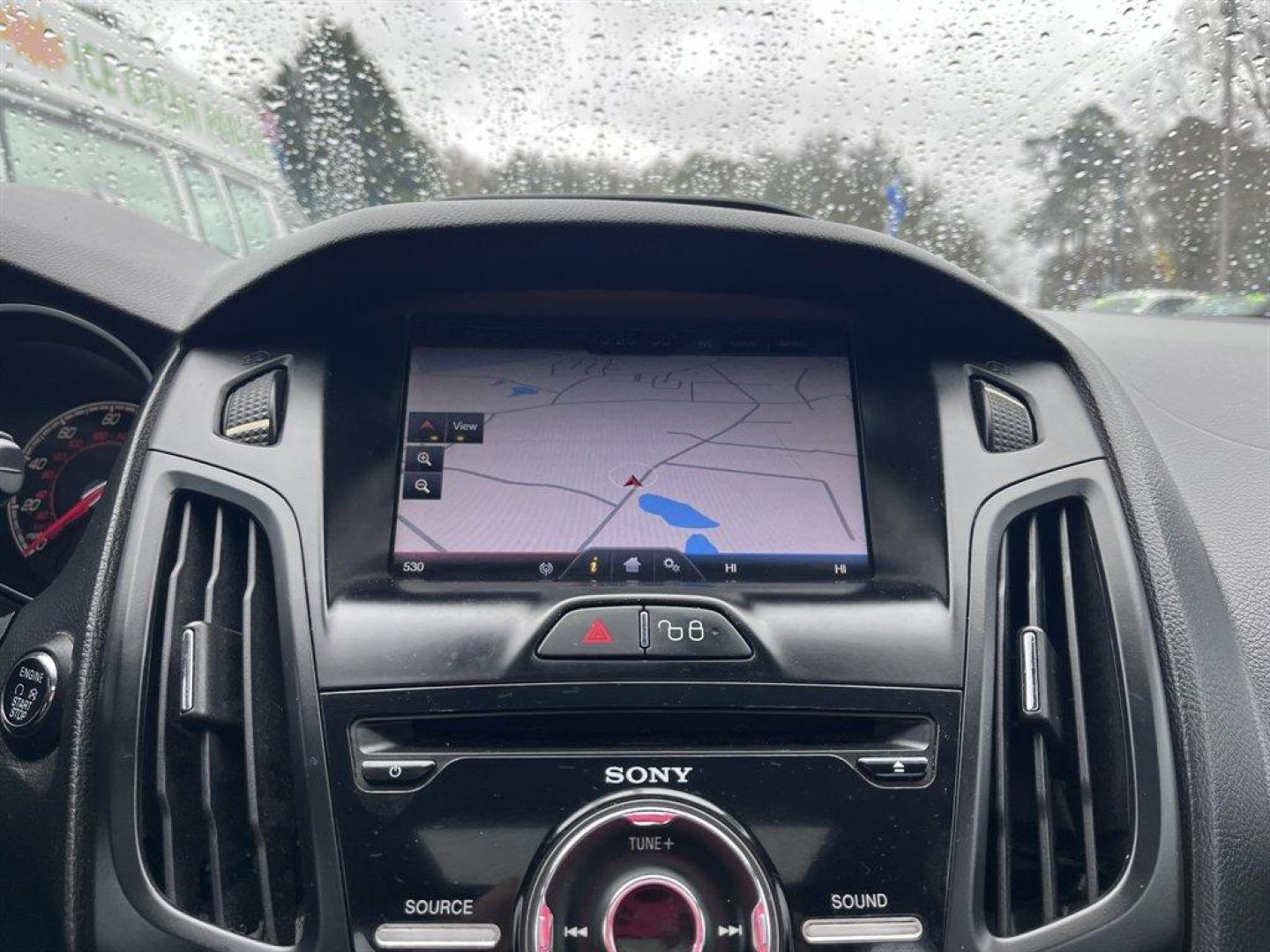 2013 Blue /Black Ford Focus (1FADP3L93DL) with an 2.0l I-4 DI T/C Ecoboost engine, Manual transmission, located at 745 East Steele Rd., West Columbia, SC, 29170, (803) 755-9148, 33.927212, -81.148483 - Special Internet Price! 2013 Ford Focus with AM/FM radio, Bluetooth, Navigation, Cruise control, Sunroof, Push to start, Keyless entry, Manual transmission, Powered windows, Powered door locks, Plus more! - Photo#14