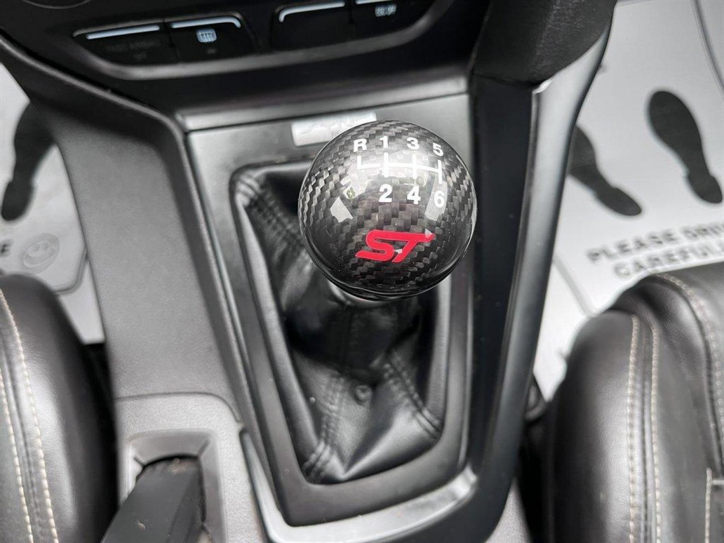 2013 Blue /Black Ford Focus (1FADP3L93DL) with an 2.0l I-4 DI T/C Ecoboost engine, Manual transmission, located at 745 East Steele Rd., West Columbia, SC, 29170, (803) 755-9148, 33.927212, -81.148483 - Special Internet Price! 2013 Ford Focus with AM/FM radio, Bluetooth, Navigation, Cruise control, Sunroof, Push to start, Keyless entry, Manual transmission, Powered windows, Powered door locks, Plus more! - Photo#16