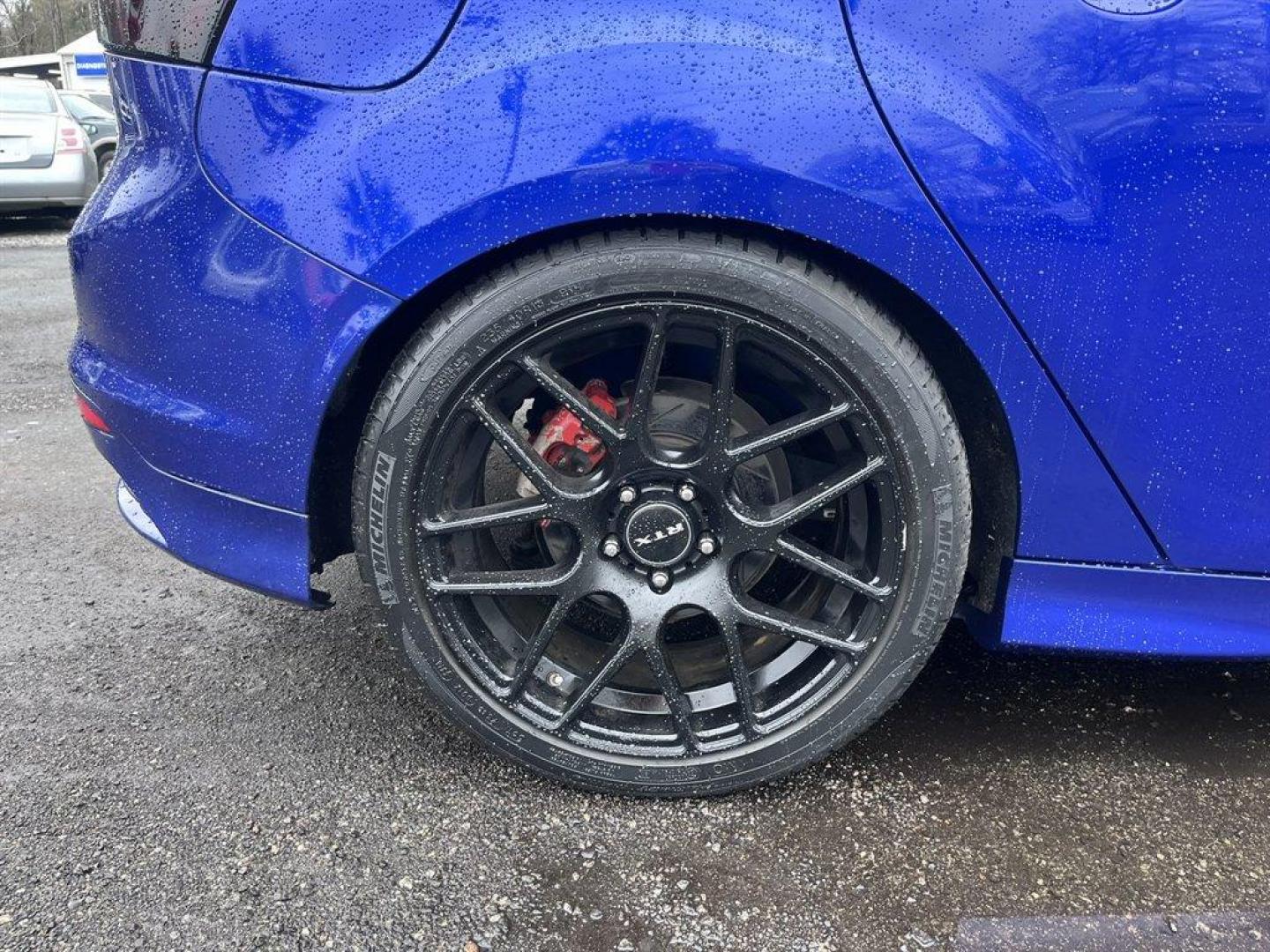 2013 Blue /Black Ford Focus (1FADP3L93DL) with an 2.0l I-4 DI T/C Ecoboost engine, Manual transmission, located at 745 East Steele Rd., West Columbia, SC, 29170, (803) 755-9148, 33.927212, -81.148483 - Special Internet Price! 2013 Ford Focus with AM/FM radio, Bluetooth, Navigation, Cruise control, Sunroof, Push to start, Keyless entry, Manual transmission, Powered windows, Powered door locks, Plus more! - Photo#34