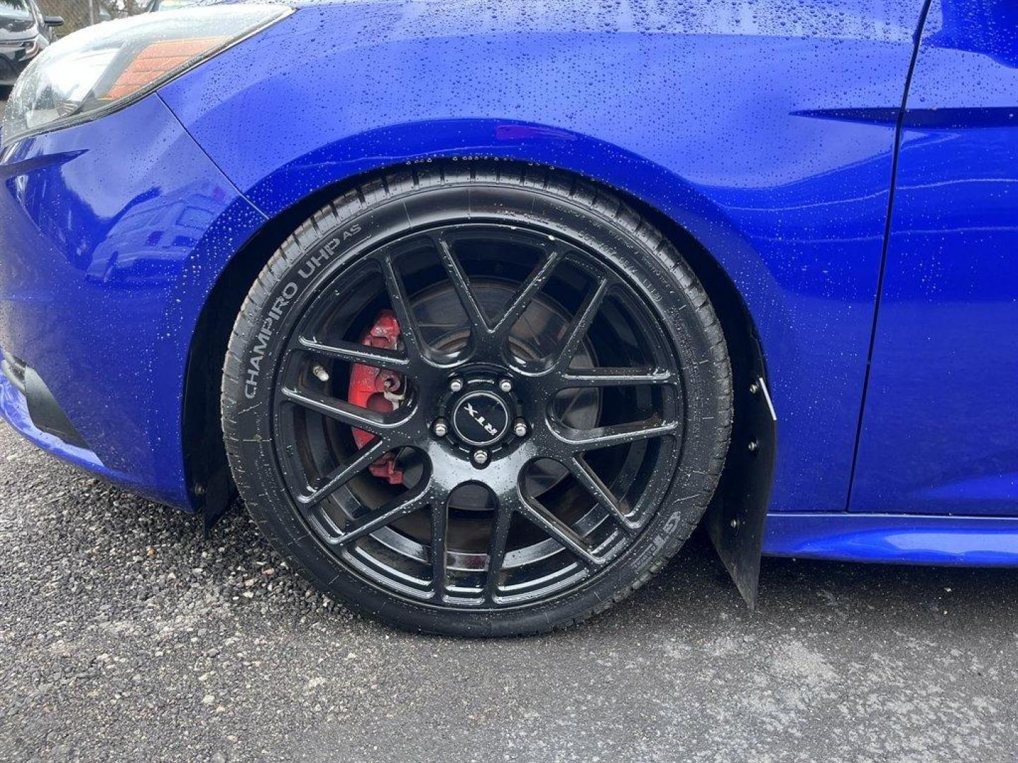 2013 Blue /Black Ford Focus (1FADP3L93DL) with an 2.0l I-4 DI T/C Ecoboost engine, Manual transmission, located at 745 East Steele Rd., West Columbia, SC, 29170, (803) 755-9148, 33.927212, -81.148483 - Special Internet Price! 2013 Ford Focus with AM/FM radio, Bluetooth, Navigation, Cruise control, Sunroof, Push to start, Keyless entry, Manual transmission, Powered windows, Powered door locks, Plus more! - Photo#36