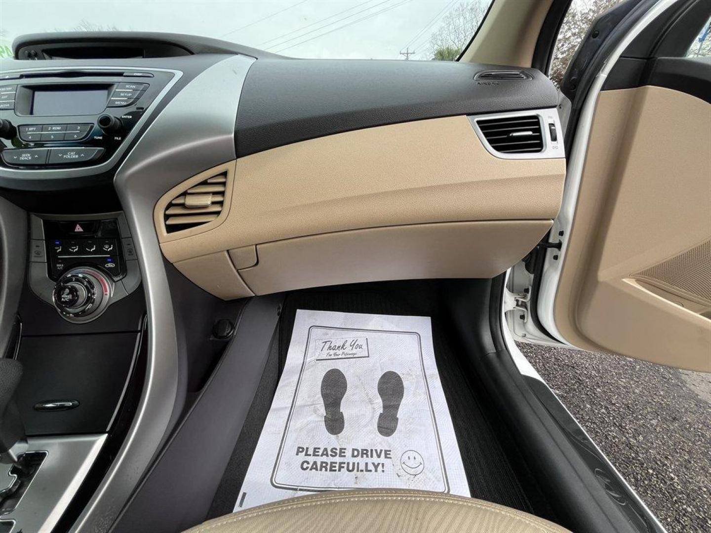 2013 White /Tan Hyundai Elantra (5NPDH4AE9DH) with an 1.8l I-4 MPI Dohc 1.8l engine, Automatic transmission, located at 745 East Steele Rd., West Columbia, SC, 29170, (803) 755-9148, 33.927212, -81.148483 - Special Internet Price! 2013 Hyundai Elantra with AM/FM radio, Cruise control, Manual air, Cloth interior, Powered windows, Powered door locks, Plus more! - Photo#24