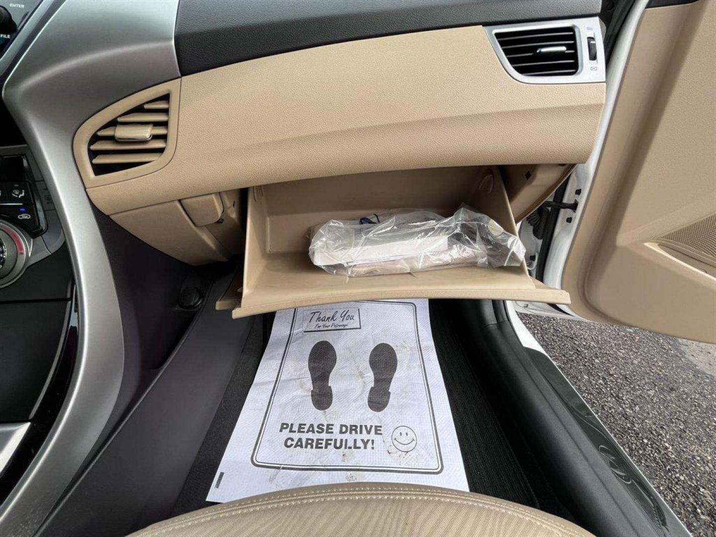 2013 White /Tan Hyundai Elantra (5NPDH4AE9DH) with an 1.8l I-4 MPI Dohc 1.8l engine, Automatic transmission, located at 745 East Steele Rd., West Columbia, SC, 29170, (803) 755-9148, 33.927212, -81.148483 - Special Internet Price! 2013 Hyundai Elantra with AM/FM radio, Cruise control, Manual air, Cloth interior, Powered windows, Powered door locks, Plus more! - Photo#25