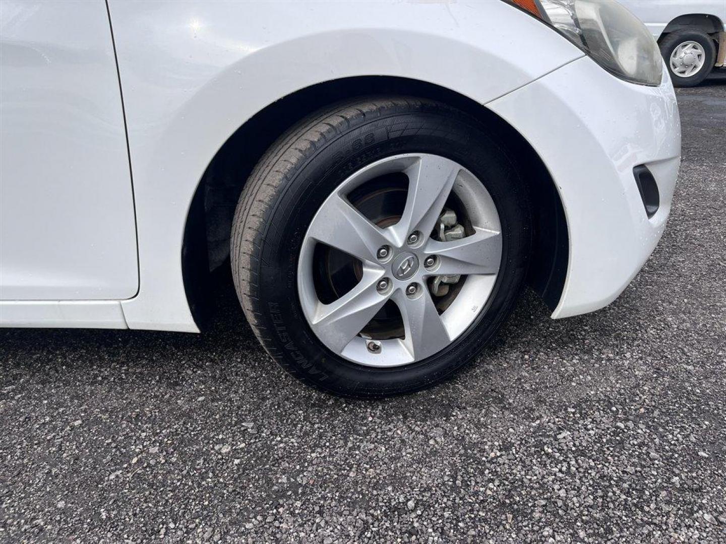 2013 White /Tan Hyundai Elantra (5NPDH4AE9DH) with an 1.8l I-4 MPI Dohc 1.8l engine, Automatic transmission, located at 745 East Steele Rd., West Columbia, SC, 29170, (803) 755-9148, 33.927212, -81.148483 - Special Internet Price! 2013 Hyundai Elantra with AM/FM radio, Cruise control, Manual air, Cloth interior, Powered windows, Powered door locks, Plus more! - Photo#26