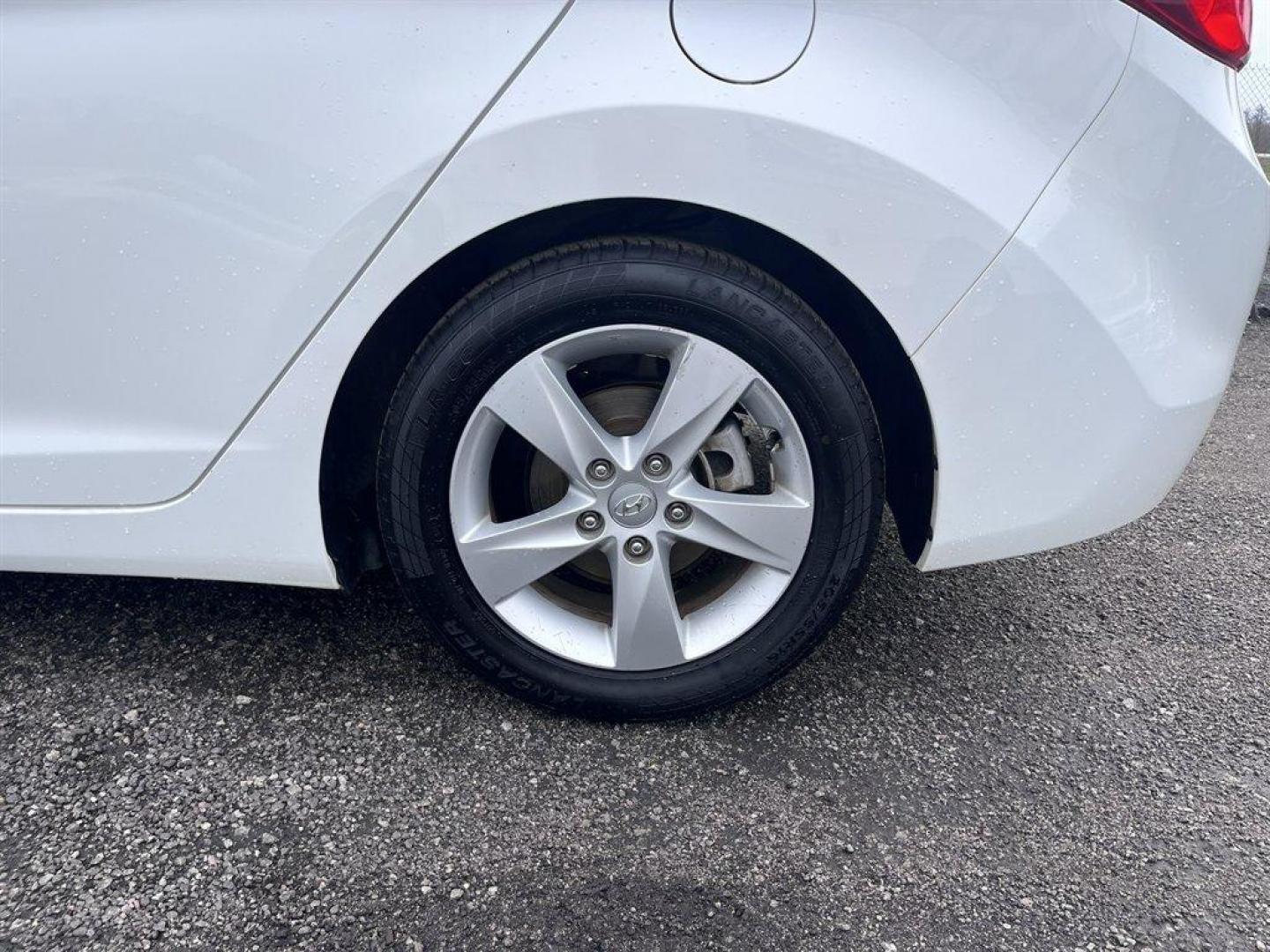 2013 White /Tan Hyundai Elantra (5NPDH4AE9DH) with an 1.8l I-4 MPI Dohc 1.8l engine, Automatic transmission, located at 745 East Steele Rd., West Columbia, SC, 29170, (803) 755-9148, 33.927212, -81.148483 - Special Internet Price! 2013 Hyundai Elantra with AM/FM radio, Cruise control, Manual air, Cloth interior, Powered windows, Powered door locks, Plus more! - Photo#28