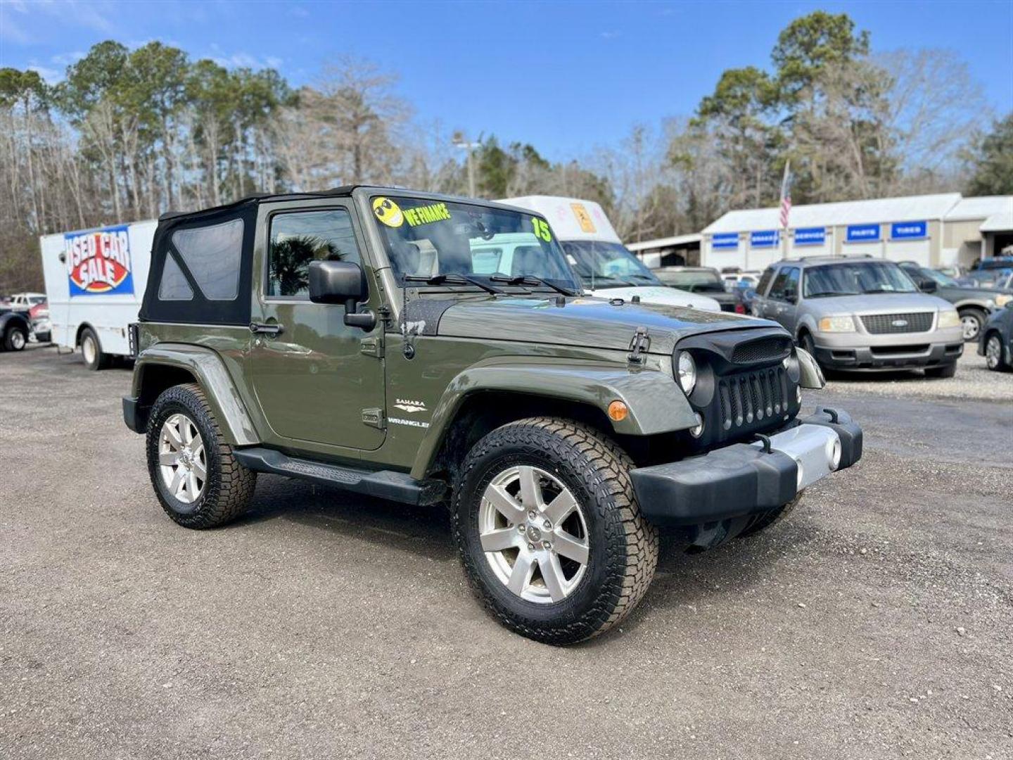 2015 Green /Black Jeep Wrangler (1C4AJWBG4FL) with an 3.6l V6 MPI Dohc 3.6l engine, Automatic transmission, located at 745 East Steele Rd., West Columbia, SC, 29170, (803) 755-9148, 33.927212, -81.148483 - Special Internet Price! 2015 Jeep Wrangler with AM/FM radio, Cruise control, 4X4, Cloth interior, Removable soft top, Power front windows, Powered door locks, Plus more! - Photo#2