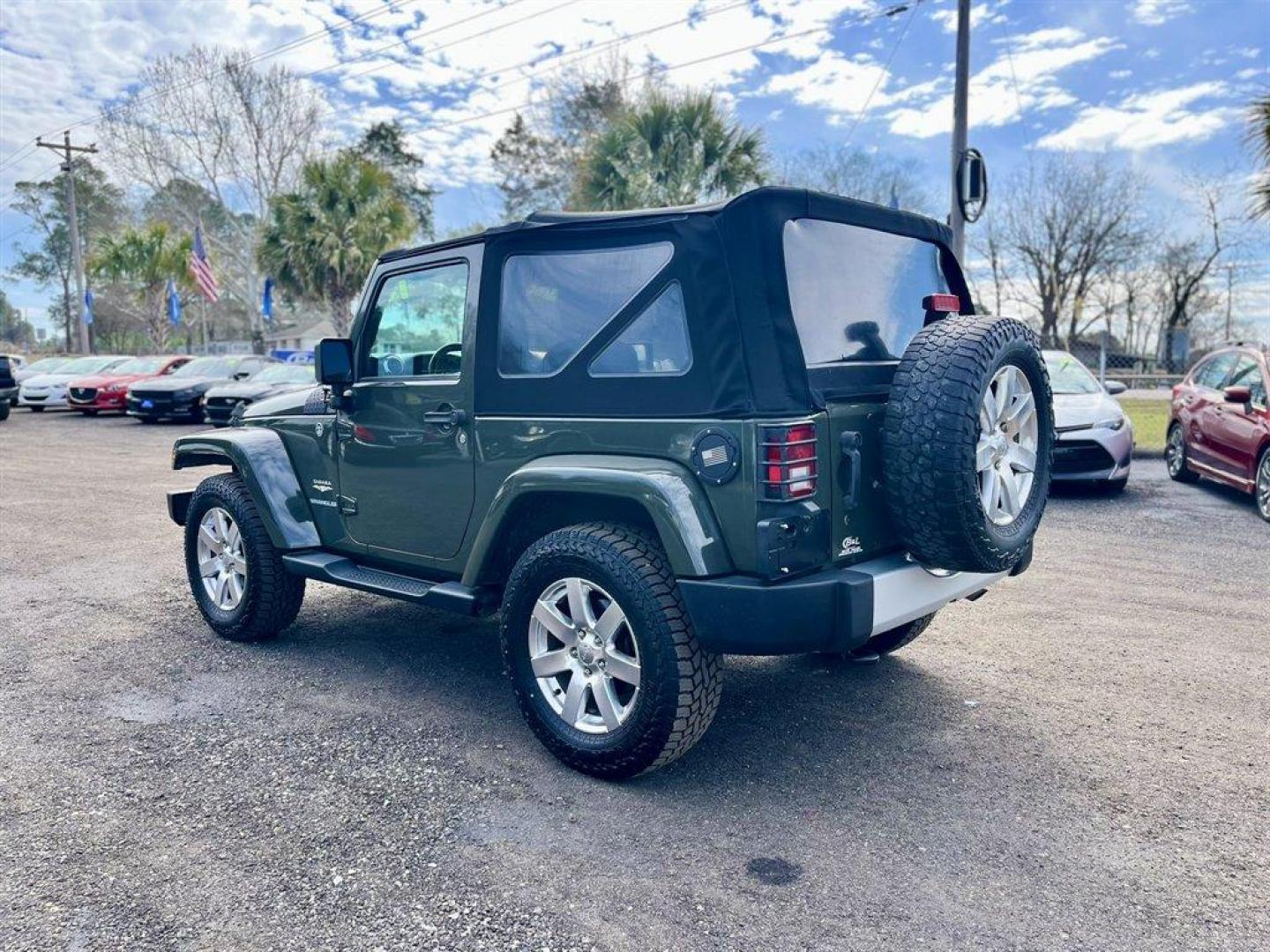 2015 Green /Black Jeep Wrangler (1C4AJWBG4FL) with an 3.6l V6 MPI Dohc 3.6l engine, Automatic transmission, located at 745 East Steele Rd., West Columbia, SC, 29170, (803) 755-9148, 33.927212, -81.148483 - Special Internet Price! 2015 Jeep Wrangler with AM/FM radio, Cruise control, 4X4, Cloth interior, Removable soft top, Power front windows, Powered door locks, Plus more! - Photo#4