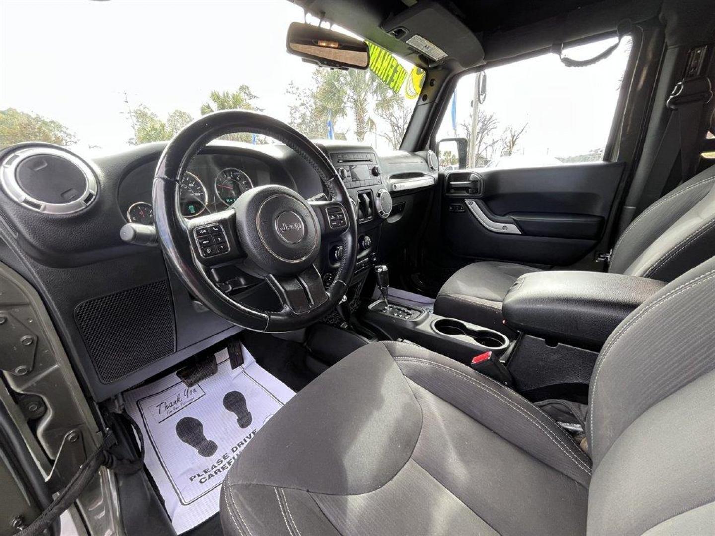 2015 Green /Black Jeep Wrangler (1C4AJWBG4FL) with an 3.6l V6 MPI Dohc 3.6l engine, Automatic transmission, located at 745 East Steele Rd., West Columbia, SC, 29170, (803) 755-9148, 33.927212, -81.148483 - Special Internet Price! 2015 Jeep Wrangler with AM/FM radio, Cruise control, 4X4, Cloth interior, Removable soft top, Power front windows, Powered door locks, Plus more! - Photo#5