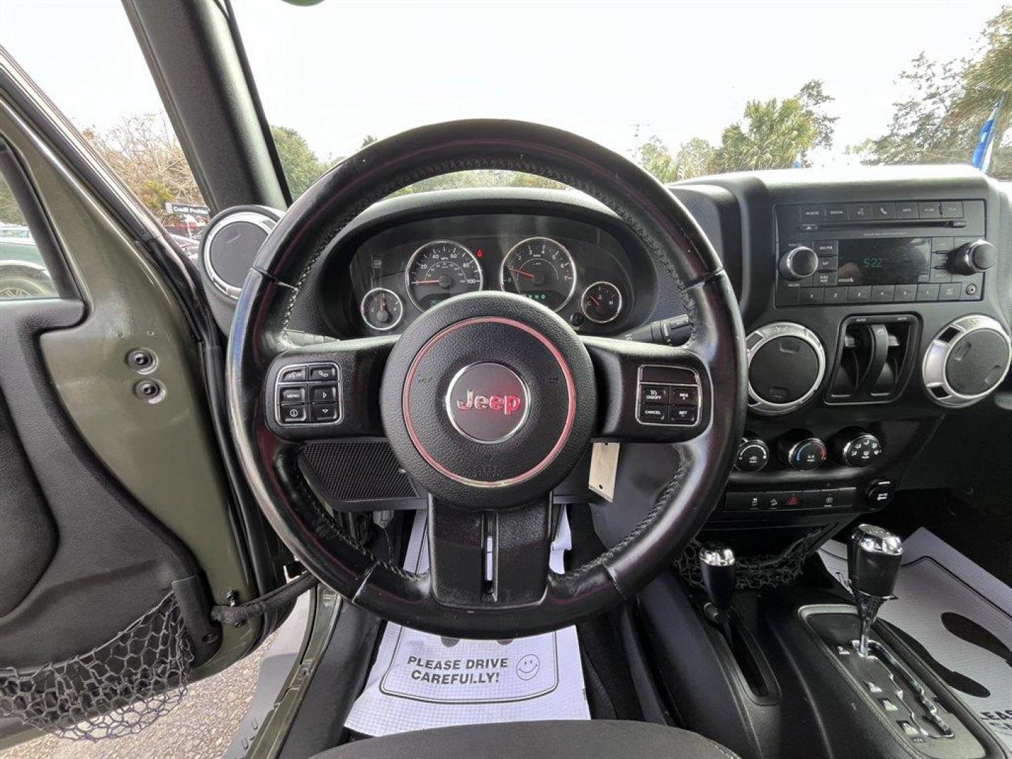 2015 Green /Black Jeep Wrangler (1C4AJWBG4FL) with an 3.6l V6 MPI Dohc 3.6l engine, Automatic transmission, located at 745 East Steele Rd., West Columbia, SC, 29170, (803) 755-9148, 33.927212, -81.148483 - Special Internet Price! 2015 Jeep Wrangler with AM/FM radio, Cruise control, 4X4, Cloth interior, Removable soft top, Power front windows, Powered door locks, Plus more! - Photo#7