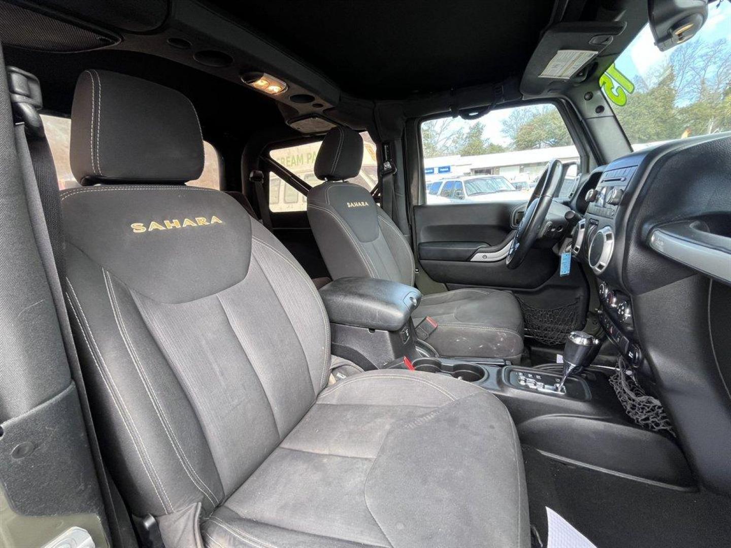 2015 Green /Black Jeep Wrangler (1C4AJWBG4FL) with an 3.6l V6 MPI Dohc 3.6l engine, Automatic transmission, located at 745 East Steele Rd., West Columbia, SC, 29170, (803) 755-9148, 33.927212, -81.148483 - Special Internet Price! 2015 Jeep Wrangler with AM/FM radio, Cruise control, 4X4, Cloth interior, Removable soft top, Power front windows, Powered door locks, Plus more! - Photo#16