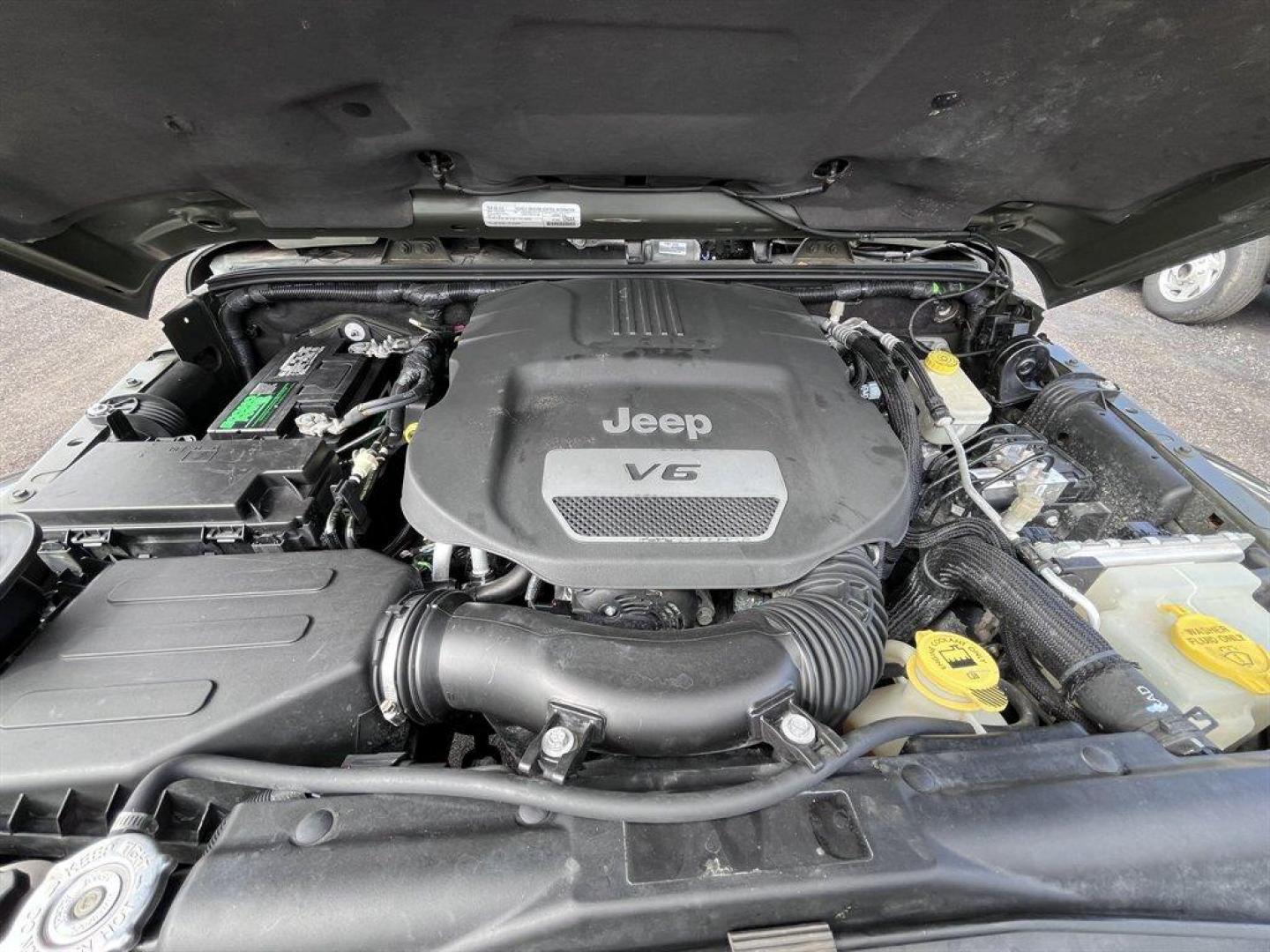 2015 Green /Black Jeep Wrangler (1C4AJWBG4FL) with an 3.6l V6 MPI Dohc 3.6l engine, Automatic transmission, located at 745 East Steele Rd., West Columbia, SC, 29170, (803) 755-9148, 33.927212, -81.148483 - Special Internet Price! 2015 Jeep Wrangler with AM/FM radio, Cruise control, 4X4, Cloth interior, Removable soft top, Power front windows, Powered door locks, Plus more! - Photo#21