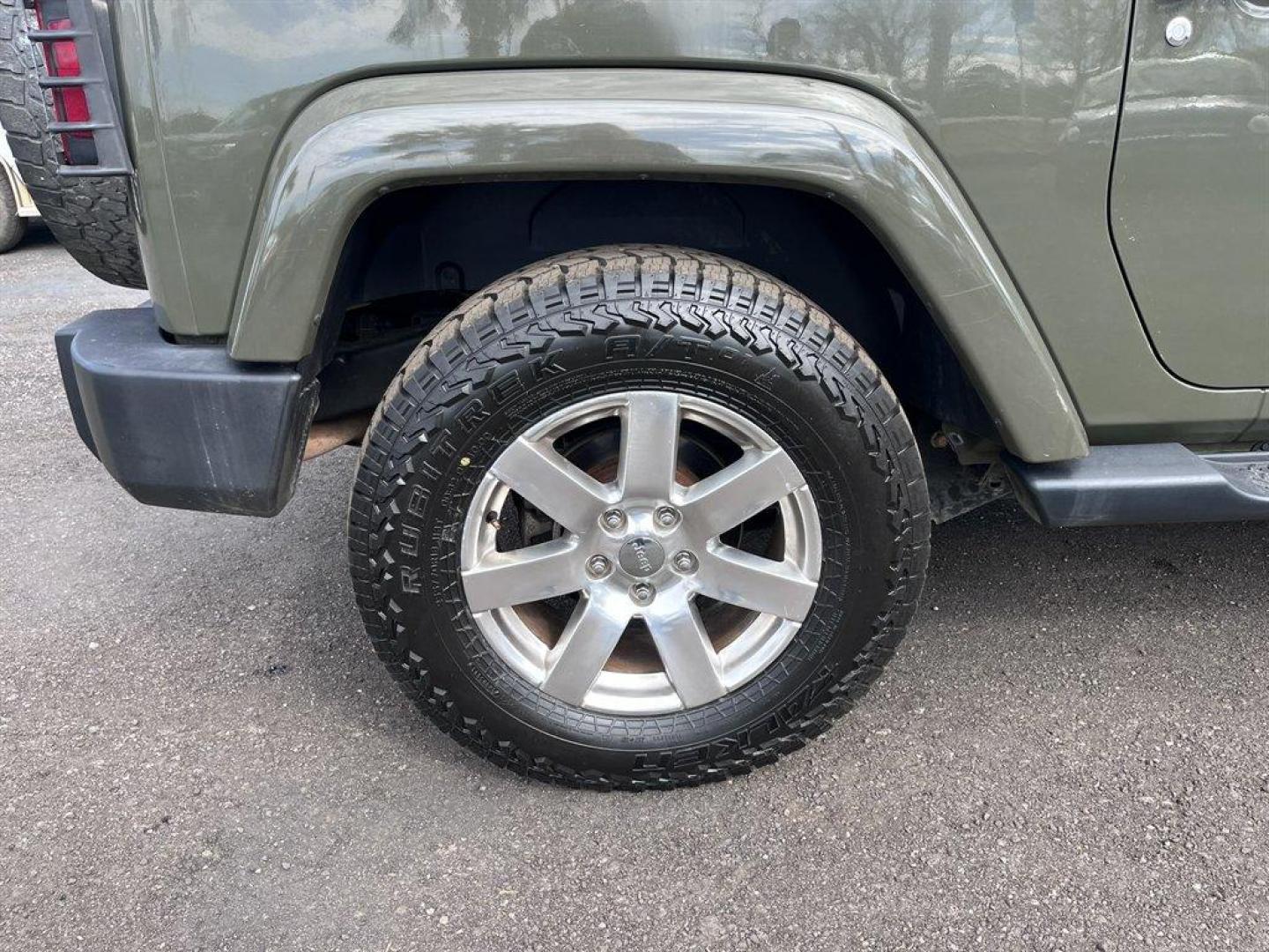 2015 Green /Black Jeep Wrangler (1C4AJWBG4FL) with an 3.6l V6 MPI Dohc 3.6l engine, Automatic transmission, located at 745 East Steele Rd., West Columbia, SC, 29170, (803) 755-9148, 33.927212, -81.148483 - Special Internet Price! 2015 Jeep Wrangler with AM/FM radio, Cruise control, 4X4, Cloth interior, Removable soft top, Power front windows, Powered door locks, Plus more! - Photo#23