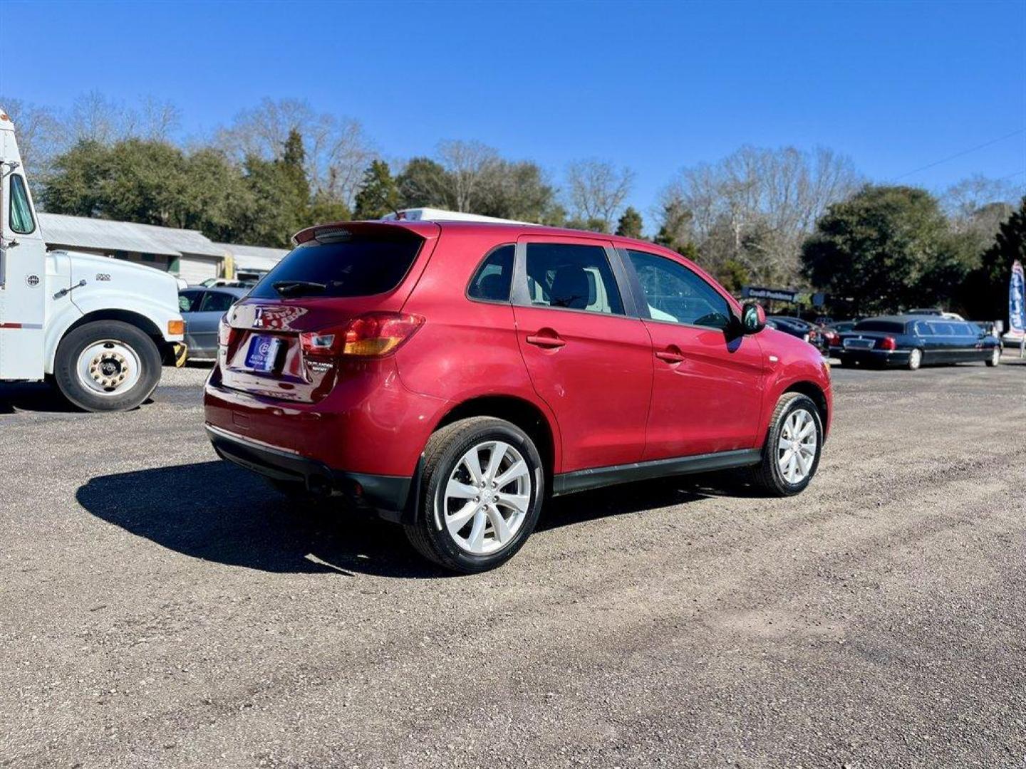 2015 Red /Black Mitsubishi Outlander Sport (4A4AP3AU8FE) with an 2.0l I-4 MPI Dohc 2.0l engine, Automatic transmission, located at 745 East Steele Rd., West Columbia, SC, 29170, (803) 755-9148, 33.927212, -81.148483 - Special Internet Price! 2015 Mitsubishi Outlander Sport with AM/FM radio, Cruise control, Manaul air conditioning, Keyless entry, Cloth interior, Powered windows, Powered door locks, Plus more! - Photo#3