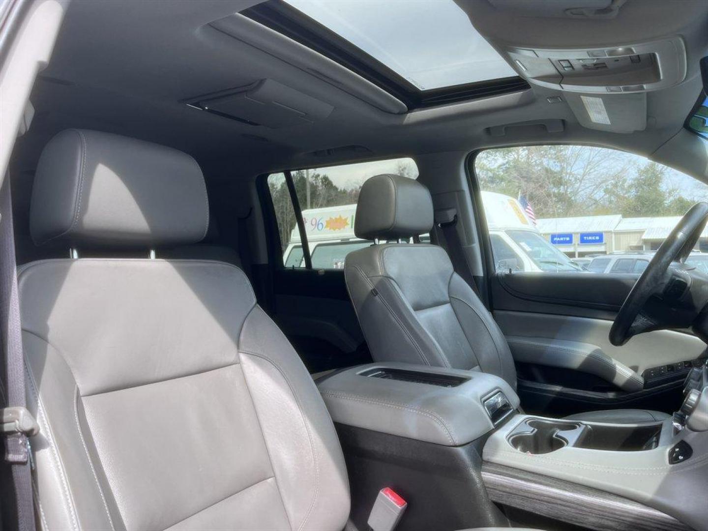 2017 Black /Grey Chevrolet Suburban (1GNSCHKC0HR) with an 5.3l V8 DI VVT Flex 5.3l engine, Automatic transmission, located at 745 East Steele Rd., West Columbia, SC, 29170, (803) 755-9148, 33.927212, -81.148483 - Special Internet Price! 2017 Chevrolet Suburban LT with AM/FM radio, Bluetooth, Backup camera, Sunroof, Push to start, Keyless entry, Leather interior, Heated seats, Rear entertainment, 3rd row seating, Powered windows, Powered door locks, Plus more! - Photo#34