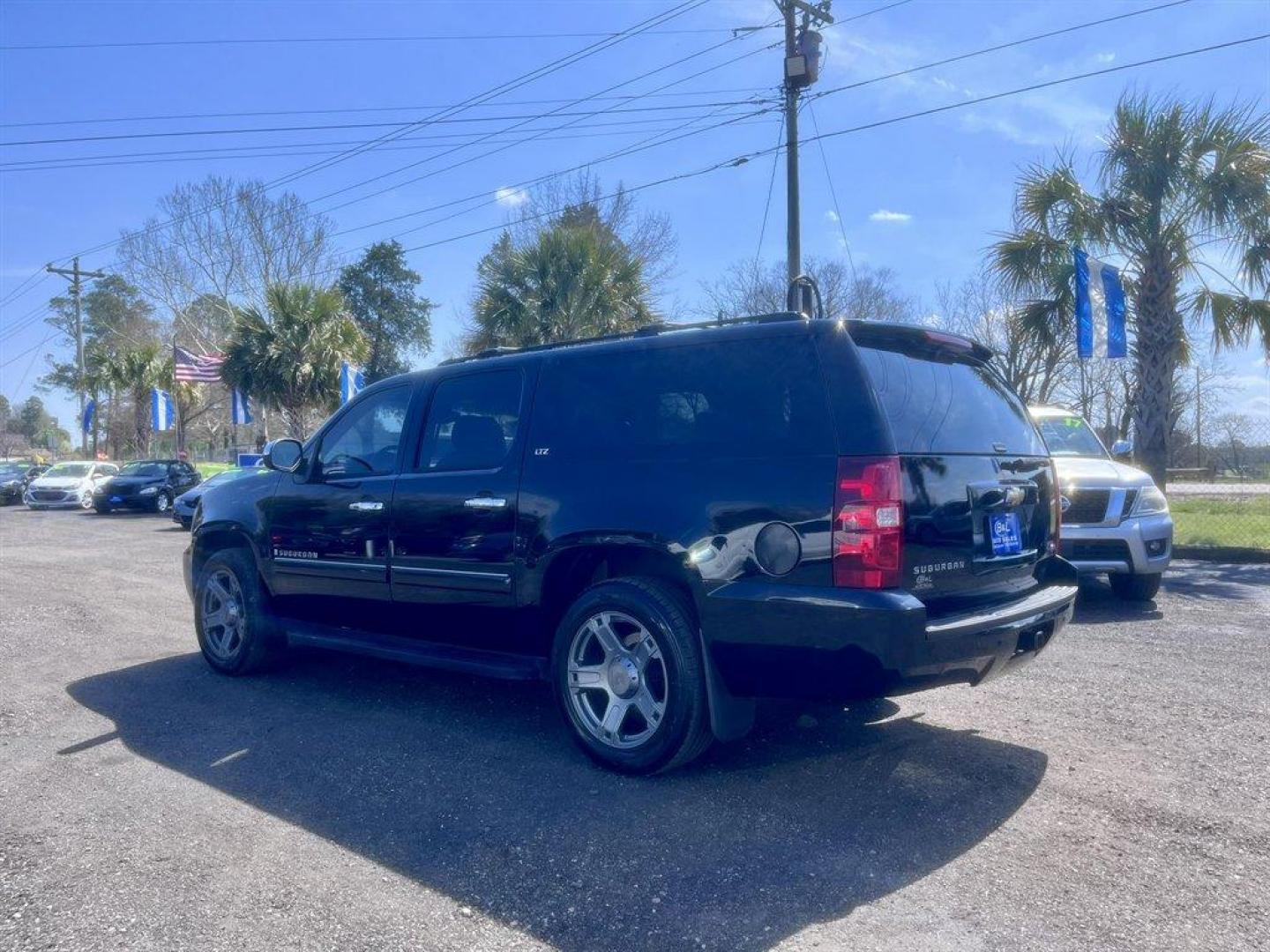 2008 Black /Black Chevrolet Suburban (3GNFC16078G) with an 5.3l V8 SFI Flex 5.3l engine, Automatic transmission, located at 745 East Steele Rd., West Columbia, SC, 29170, (803) 755-9148, 33.927212, -81.148483 - Special Internet Price! 2008 Chevrolet Suburban LTZ with AM/FM radio, Bluetooth, Backup camera, Navigation, Cruise control, Sunroof, Keyless entry, Leather interior, Powered front seats, Heated seats, Rear entertainment, 3rd row seating, Powered windows, Powered liftgate, Powered door locks, Plus mo - Photo#5