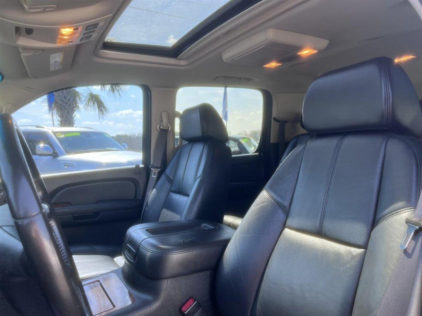 2008 Black /Black Chevrolet Suburban (3GNFC16078G) with an 5.3l V8 SFI Flex 5.3l engine, Automatic transmission, located at 745 East Steele Rd., West Columbia, SC, 29170, (803) 755-9148, 33.927212, -81.148483 - Special Internet Price! 2008 Chevrolet Suburban LTZ with AM/FM radio, Bluetooth, Backup camera, Navigation, Cruise control, Sunroof, Keyless entry, Leather interior, Powered front seats, Heated seats, Rear entertainment, 3rd row seating, Powered windows, Powered liftgate, Powered door locks, Plus mo - Photo#22