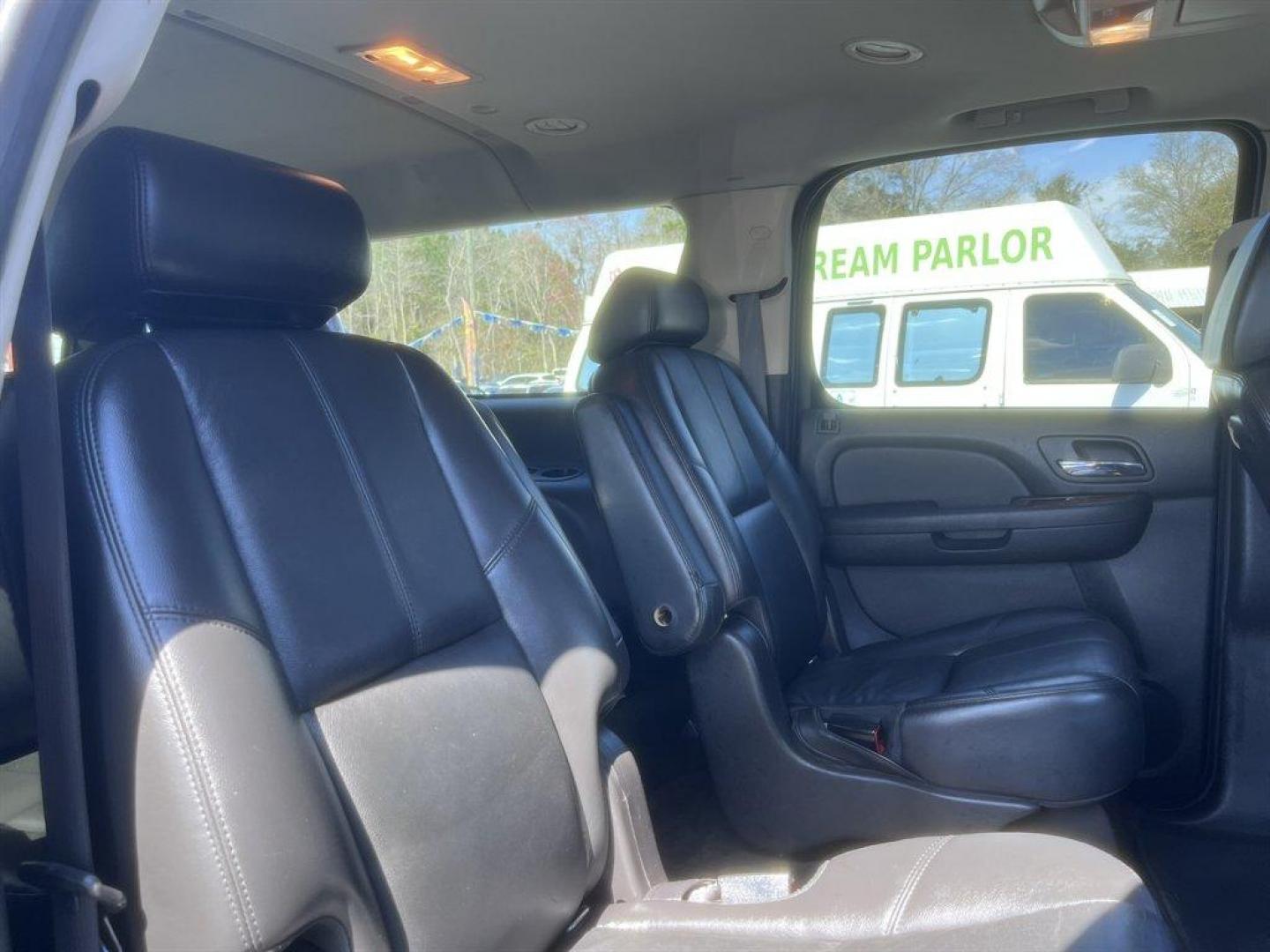 2008 Black /Black Chevrolet Suburban (3GNFC16078G) with an 5.3l V8 SFI Flex 5.3l engine, Automatic transmission, located at 745 East Steele Rd., West Columbia, SC, 29170, (803) 755-9148, 33.927212, -81.148483 - Special Internet Price! 2008 Chevrolet Suburban LTZ with AM/FM radio, Bluetooth, Backup camera, Navigation, Cruise control, Sunroof, Keyless entry, Leather interior, Powered front seats, Heated seats, Rear entertainment, 3rd row seating, Powered windows, Powered liftgate, Powered door locks, Plus mo - Photo#30