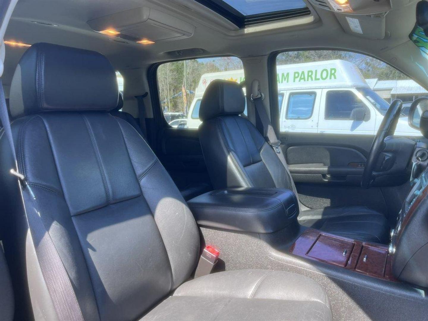 2008 Black /Black Chevrolet Suburban (3GNFC16078G) with an 5.3l V8 SFI Flex 5.3l engine, Automatic transmission, located at 745 East Steele Rd., West Columbia, SC, 29170, (803) 755-9148, 33.927212, -81.148483 - Special Internet Price! 2008 Chevrolet Suburban LTZ with AM/FM radio, Bluetooth, Backup camera, Navigation, Cruise control, Sunroof, Keyless entry, Leather interior, Powered front seats, Heated seats, Rear entertainment, 3rd row seating, Powered windows, Powered liftgate, Powered door locks, Plus mo - Photo#32