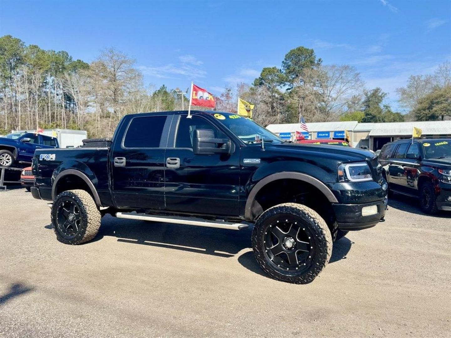 2005 Black /Black Ford F150 (1FTPW14535K) with an 5.4l V8 EFI Sohc 5.4l engine, Automatic transmission, located at 745 East Steele Rd., West Columbia, SC, 29170, (803) 755-9148, 33.927212, -81.148483 - Photo#2