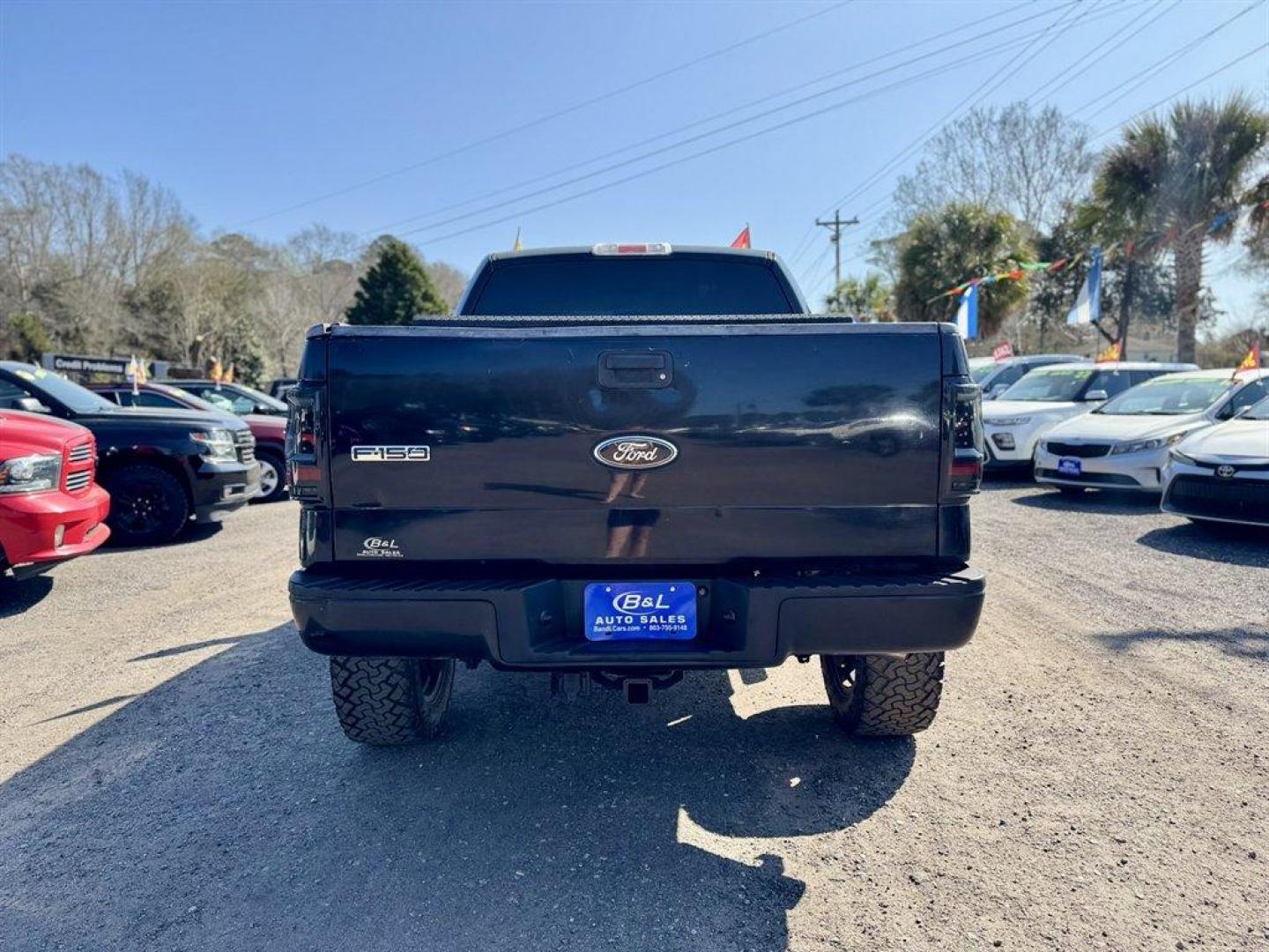 2005 Black /Black Ford F150 (1FTPW14535K) with an 5.4l V8 EFI Sohc 5.4l engine, Automatic transmission, located at 745 East Steele Rd., West Columbia, SC, 29170, (803) 755-9148, 33.927212, -81.148483 - Photo#4