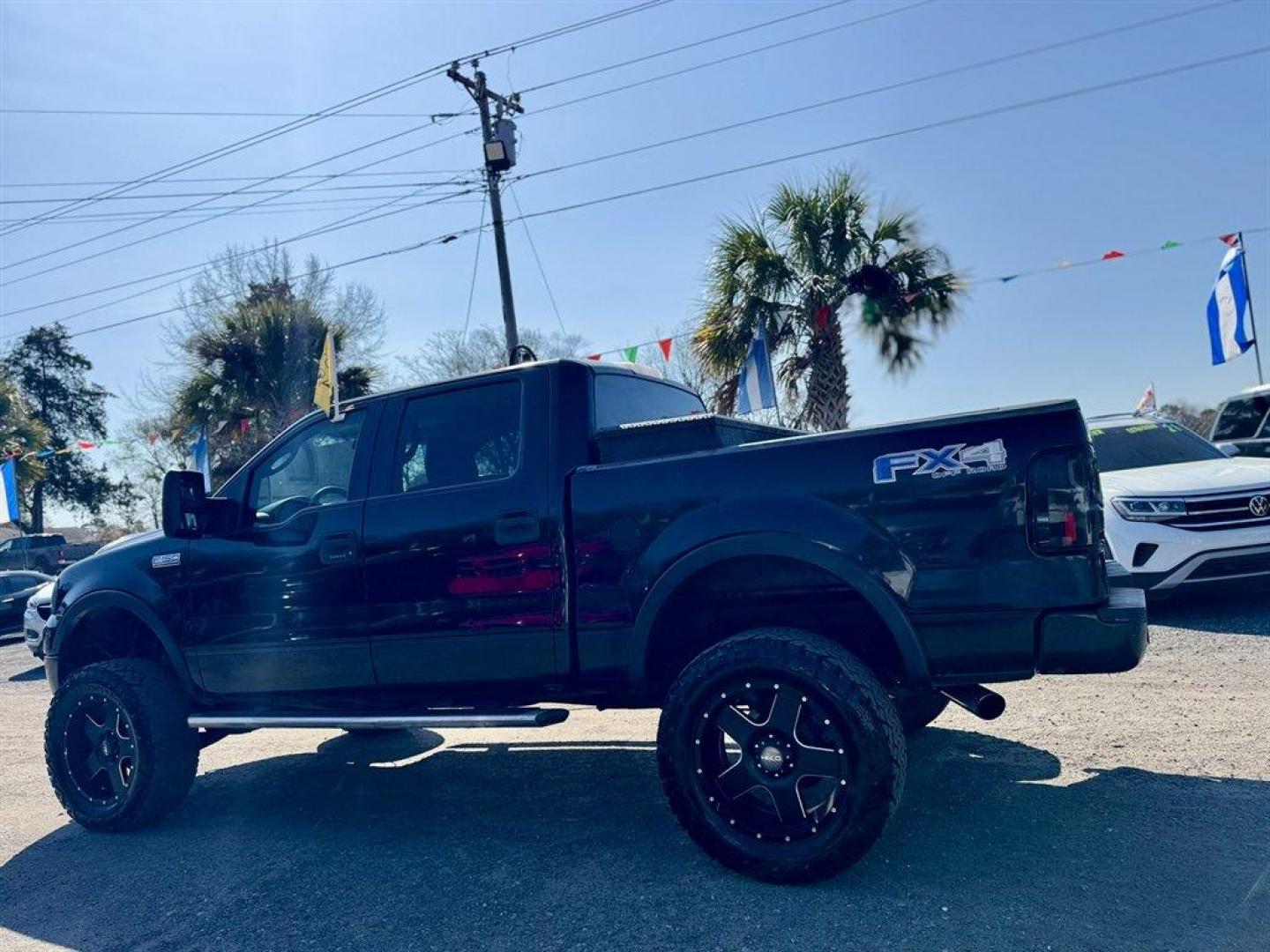 2005 Black /Black Ford F150 (1FTPW14535K) with an 5.4l V8 EFI Sohc 5.4l engine, Automatic transmission, located at 745 East Steele Rd., West Columbia, SC, 29170, (803) 755-9148, 33.927212, -81.148483 - Photo#5